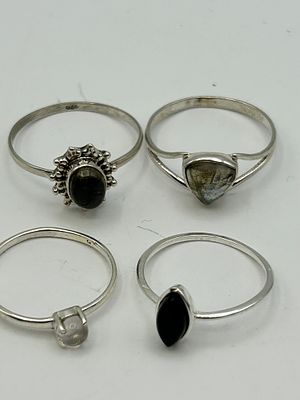 A Collection of 4 Silver and Semi-Precious Gemstone Dress Rings