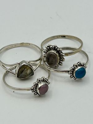 A Collection of 4 Silver and Assorted Gemstone Hippie Style Rings