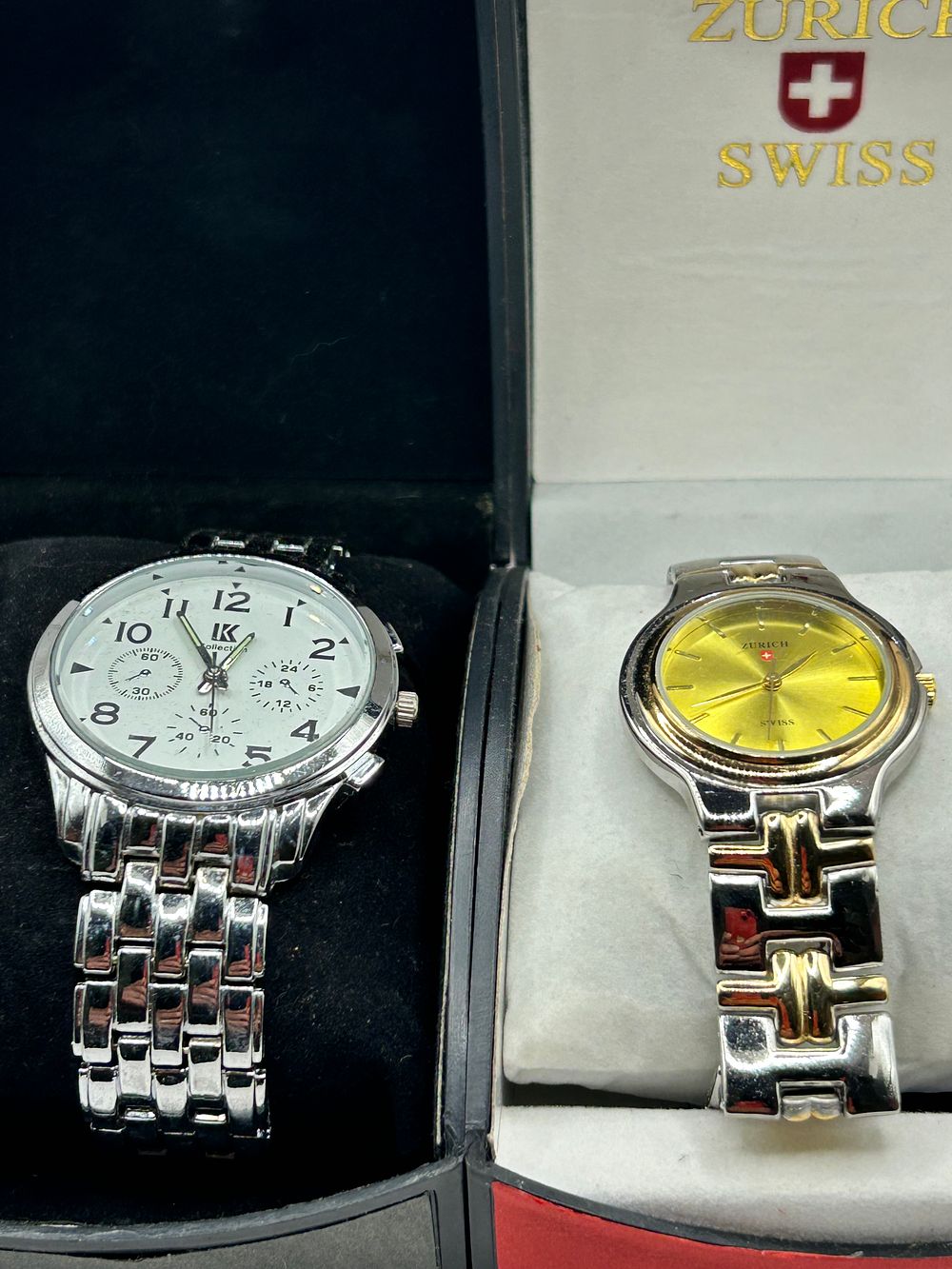 Lot 259: Two wristwatches comprising a Zurich Swiss two-tone model and an IK Collection silver-tone model
