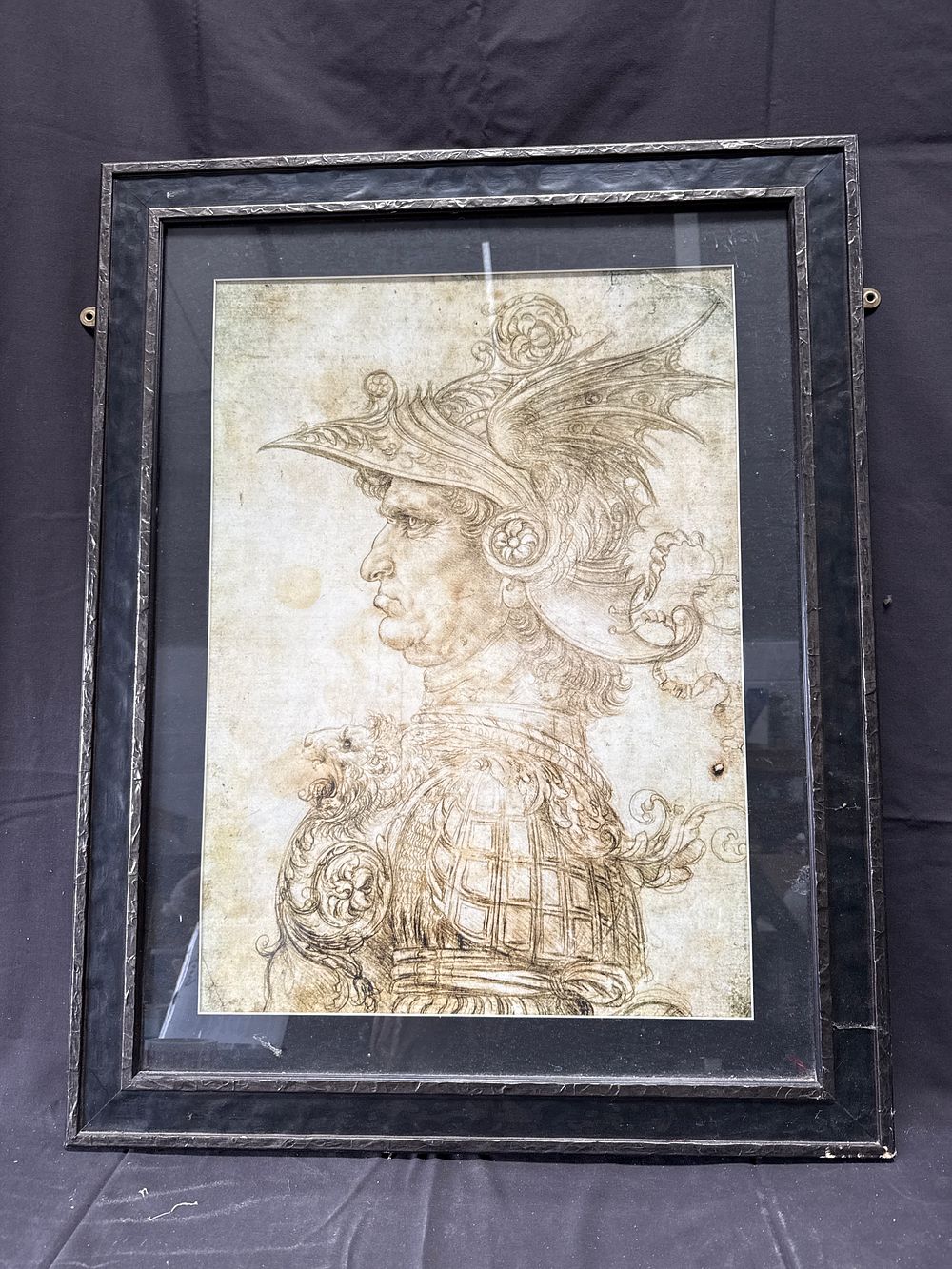 Lot 306: After Leonardo da Vinci, Profile of a Warrior in Helmet, Framed Print, 29 x 37 Inches