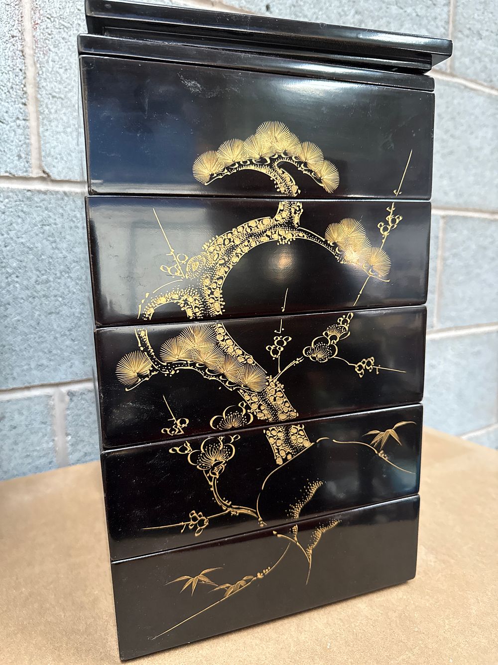 Lot 937: Japanese Five-Tier Lacquered Wood Jubako with Gold Maki-e Decoration