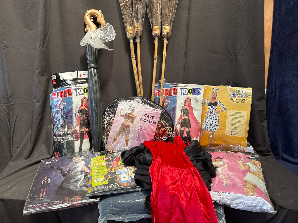 Lot 940: A Collection of Adult Fancy Dress Costumes and Accessories including Smiffys and Rubie's Brands
