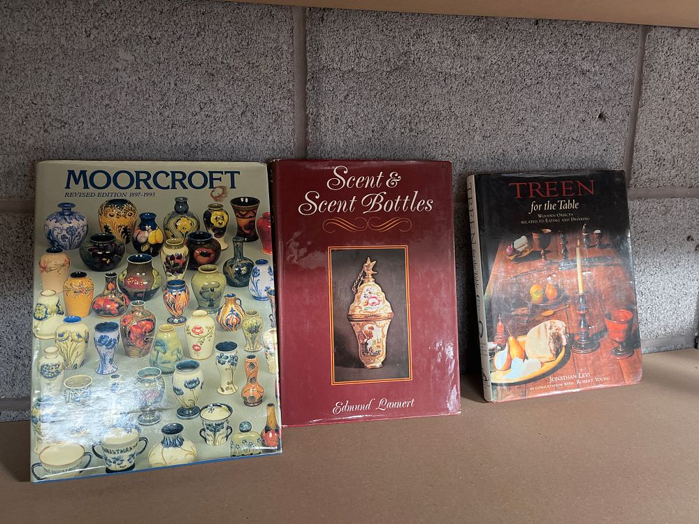 Lot 1076: Three Volumes: Reference Works on Moorcroft Pottery, Scent Bottles, and Treen. Various Publishers. (DJ)