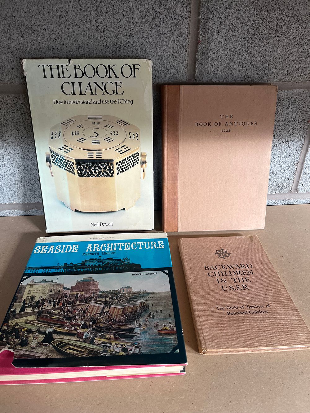 Lot 1077: A Collection of Books including Works on Architecture, Antiques, and the I Ching (DJ)