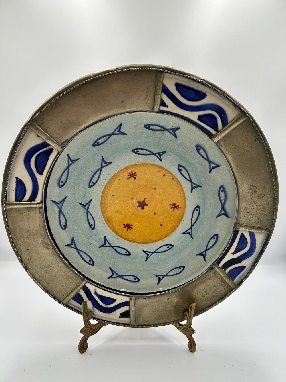 Lot 1107: A Mixed-Media Ceramic and White Metal Wall Plaque with Fish Decoration