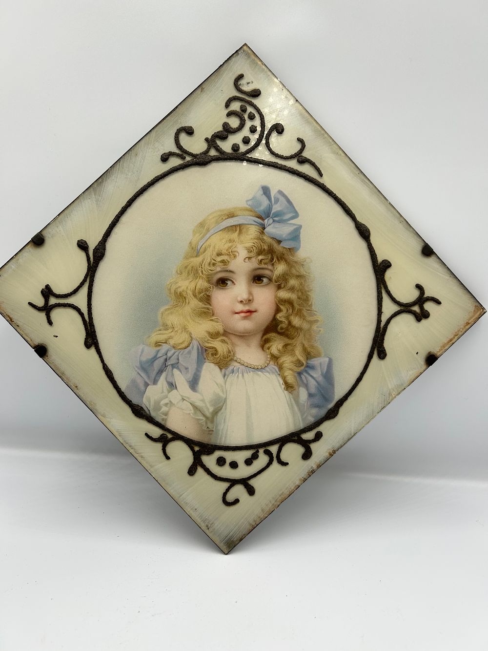 Lot 1129: Victorian Lithographic Chimney Flue Cover with Portrait of a Girl