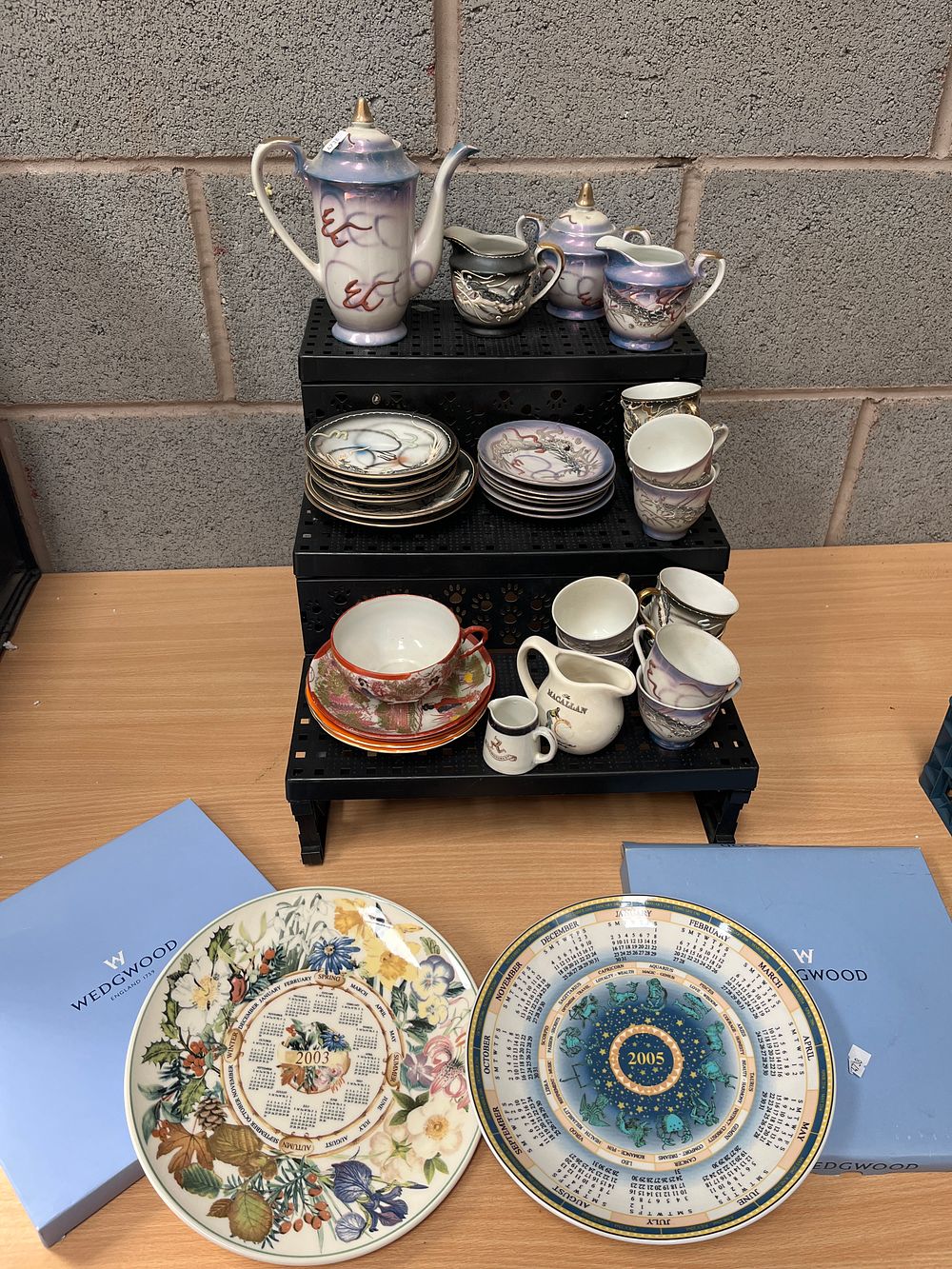 Lot 493: A Collection of Japanese Dragonware Porcelain Advertising Jugs and Wedgwood Calendar Plates