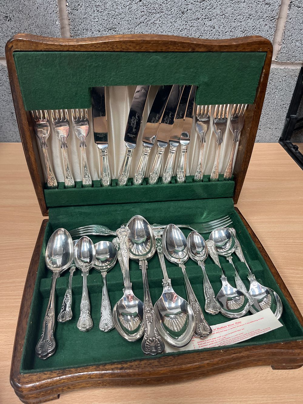 Lot 575: A Canteen of Sheffield Silver Plated Kings Pattern Flatware for Six Place Settings by Smith Seymour Ltd