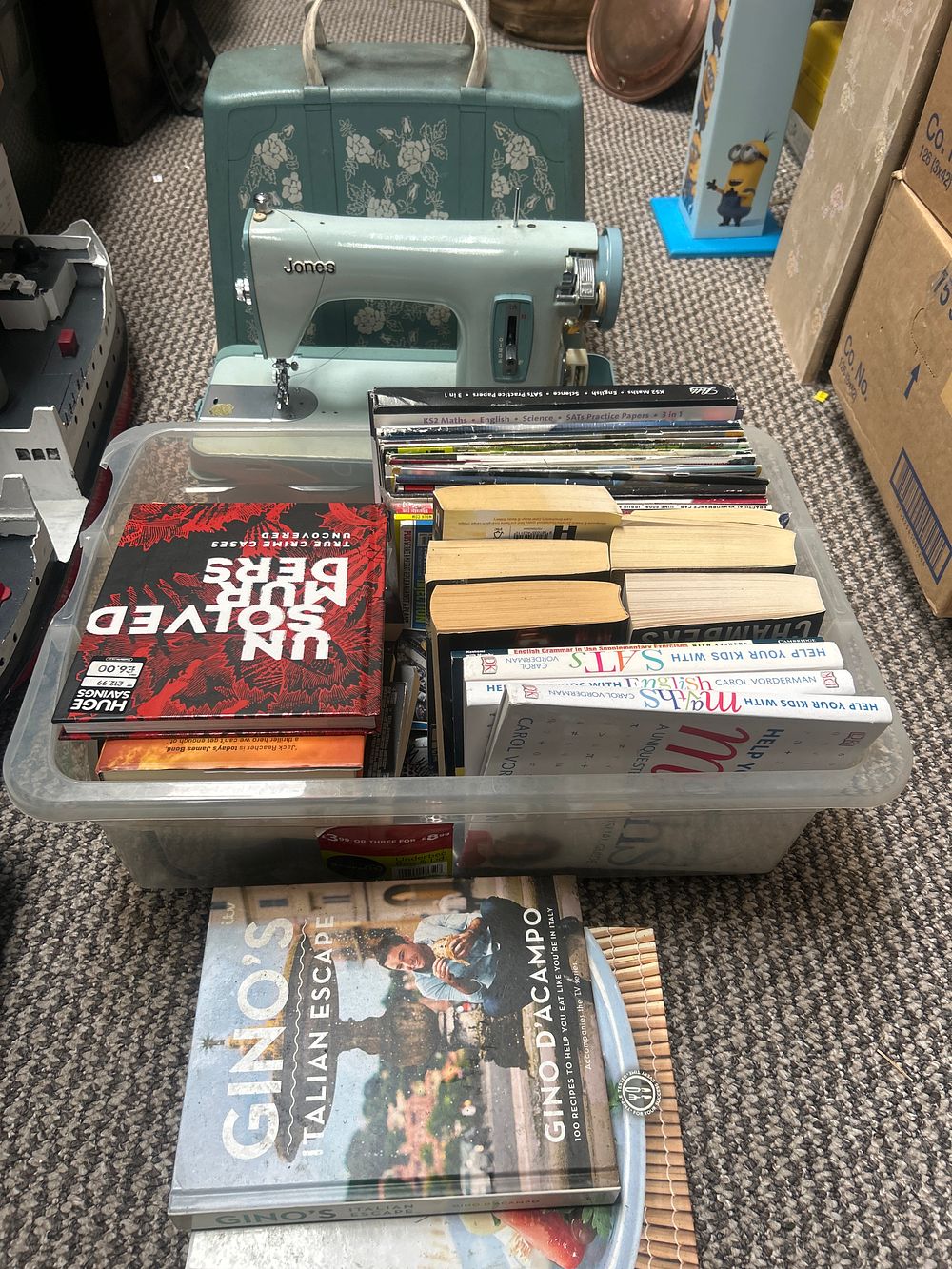Lot 823: A Vintage Jones Electric Sewing Machine with Carrying Case and an Assortment of Books and Media