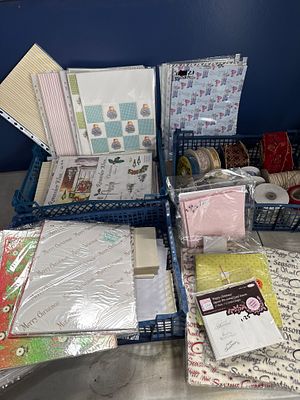 An Assortment of Craft Supplies and Haberdashery including Ribbons and Cardmaking Materials. A 