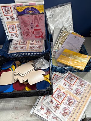 A Collection of Papercrafting and Scrapbooking Supplies including Stencils, Cardstock and 