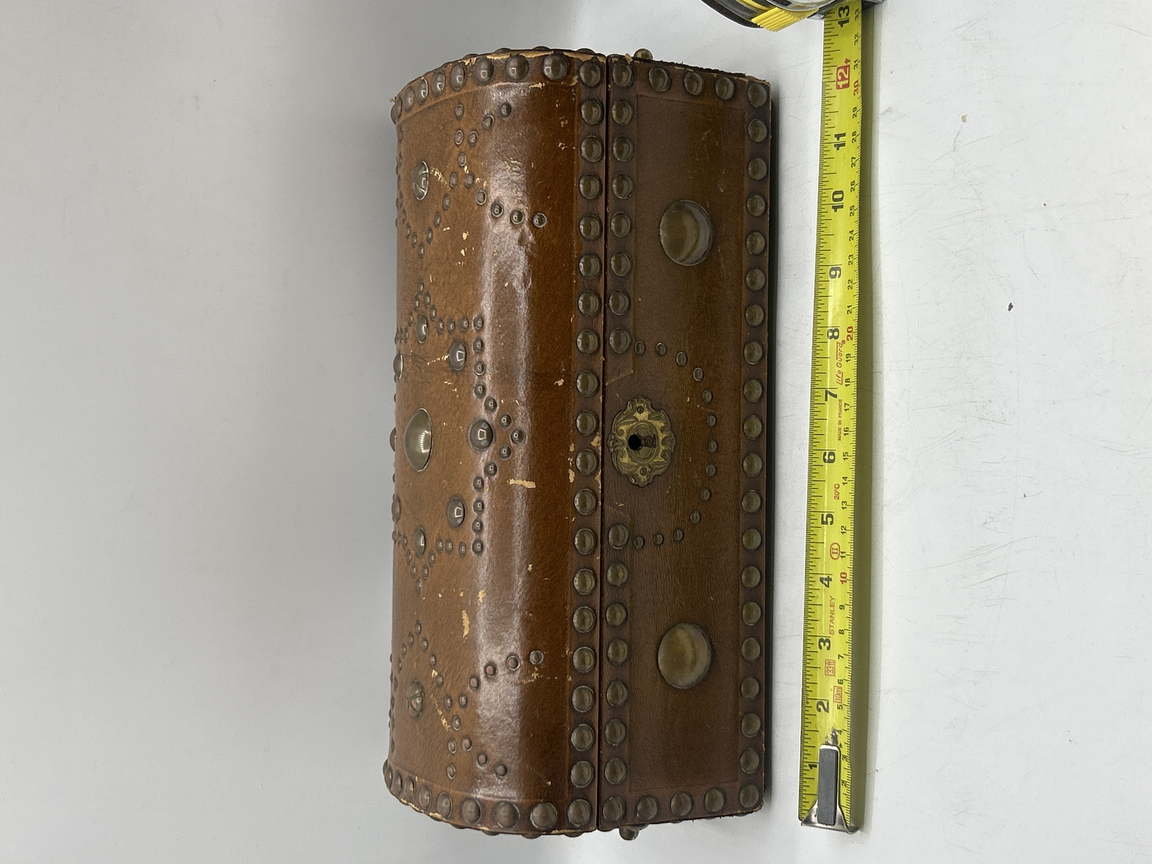 A Studded Leather Dome-Top Box with Velvet Lining