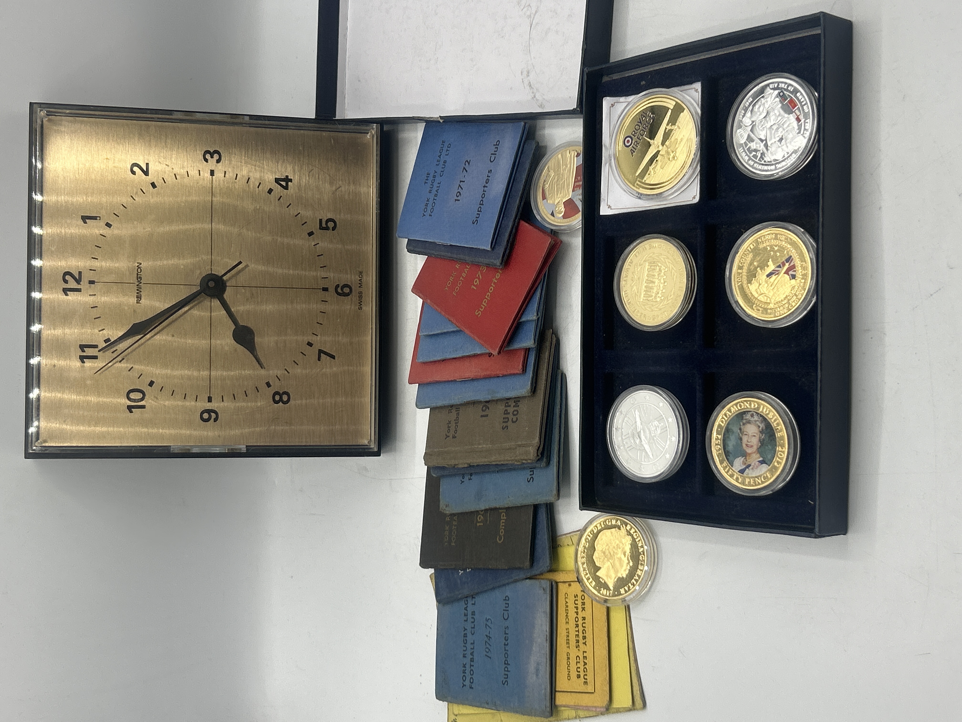 A Collection of Commemorative Medals, a Remington Desk Clock, and York Rugby League Club Ephemera