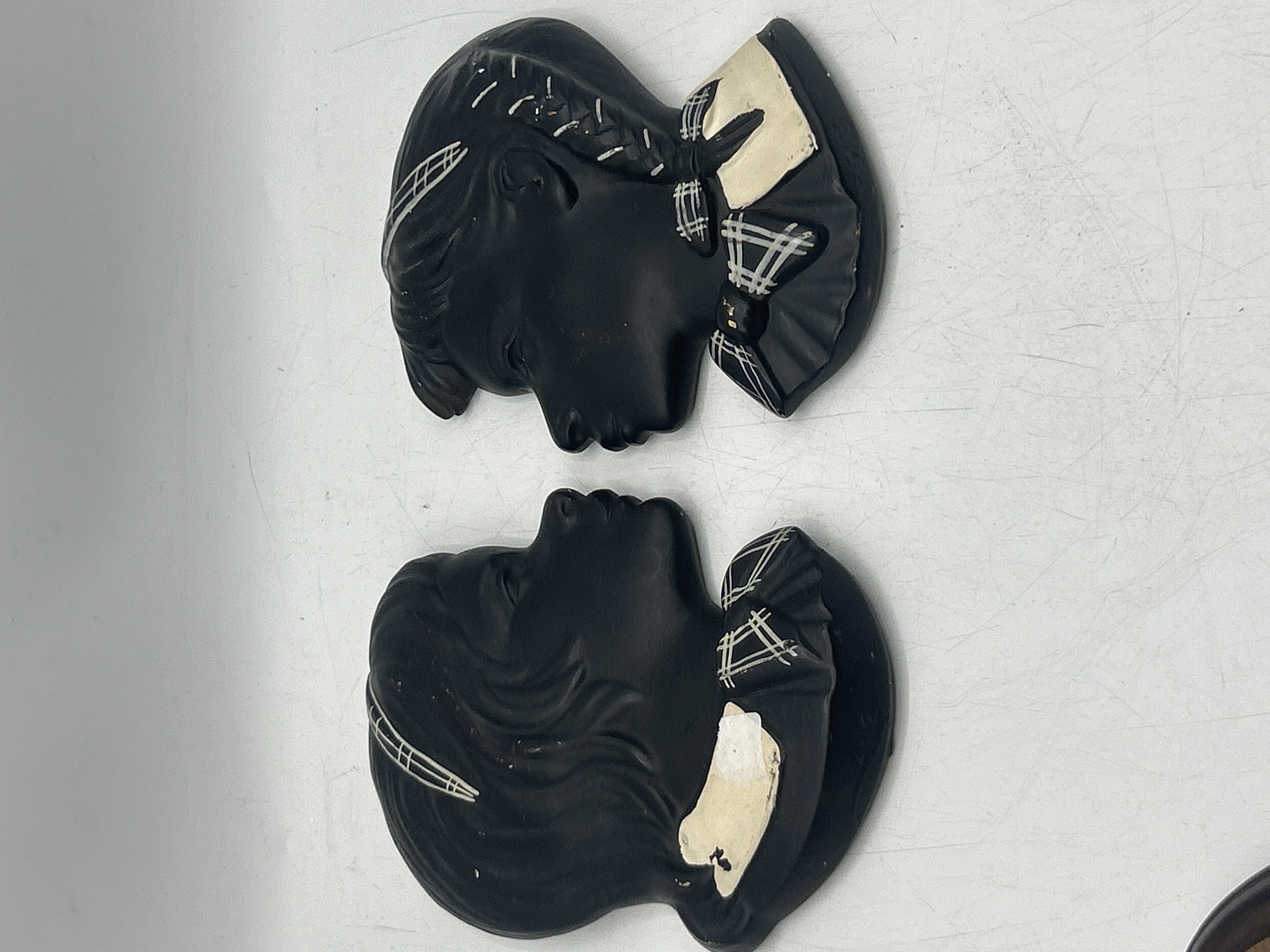 A Pair of Duron Chalkware Wall Plaques
