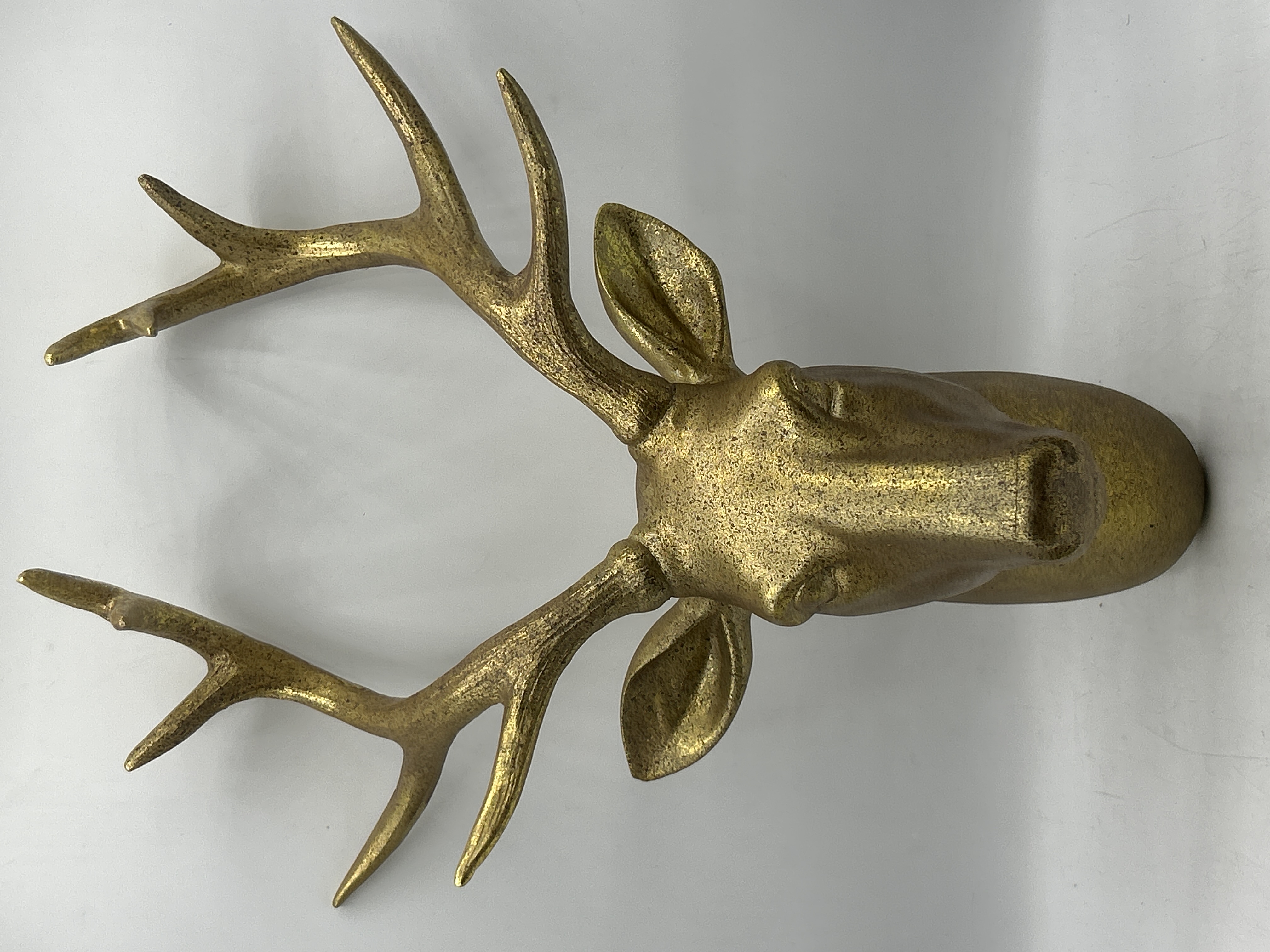 A Contemporary Gilt-Finished Cast Metal Stag's Head Wall Mount