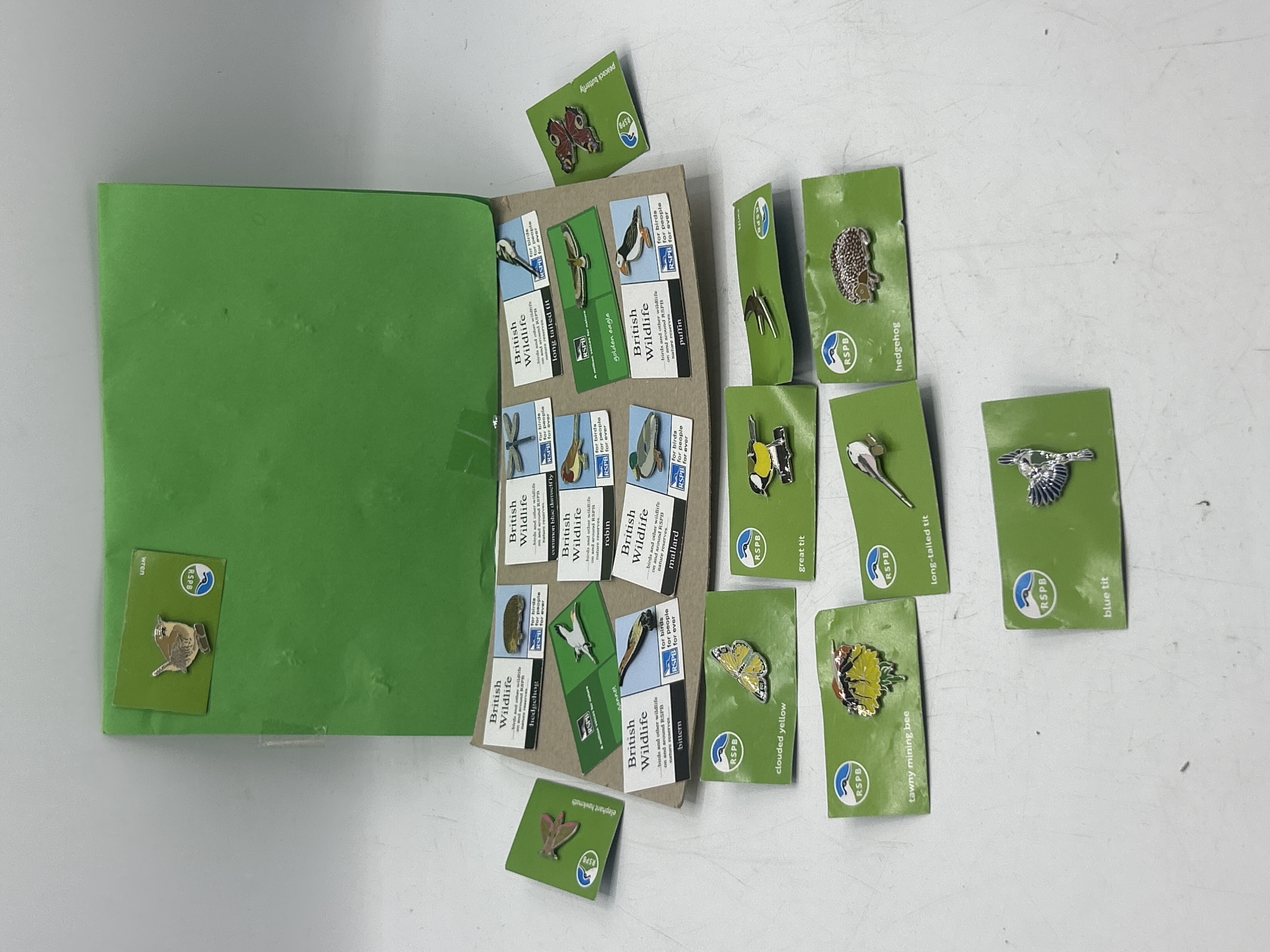 A Collection of RSPB Enamel Wildlife Pin Badges on Original Backing Cards
