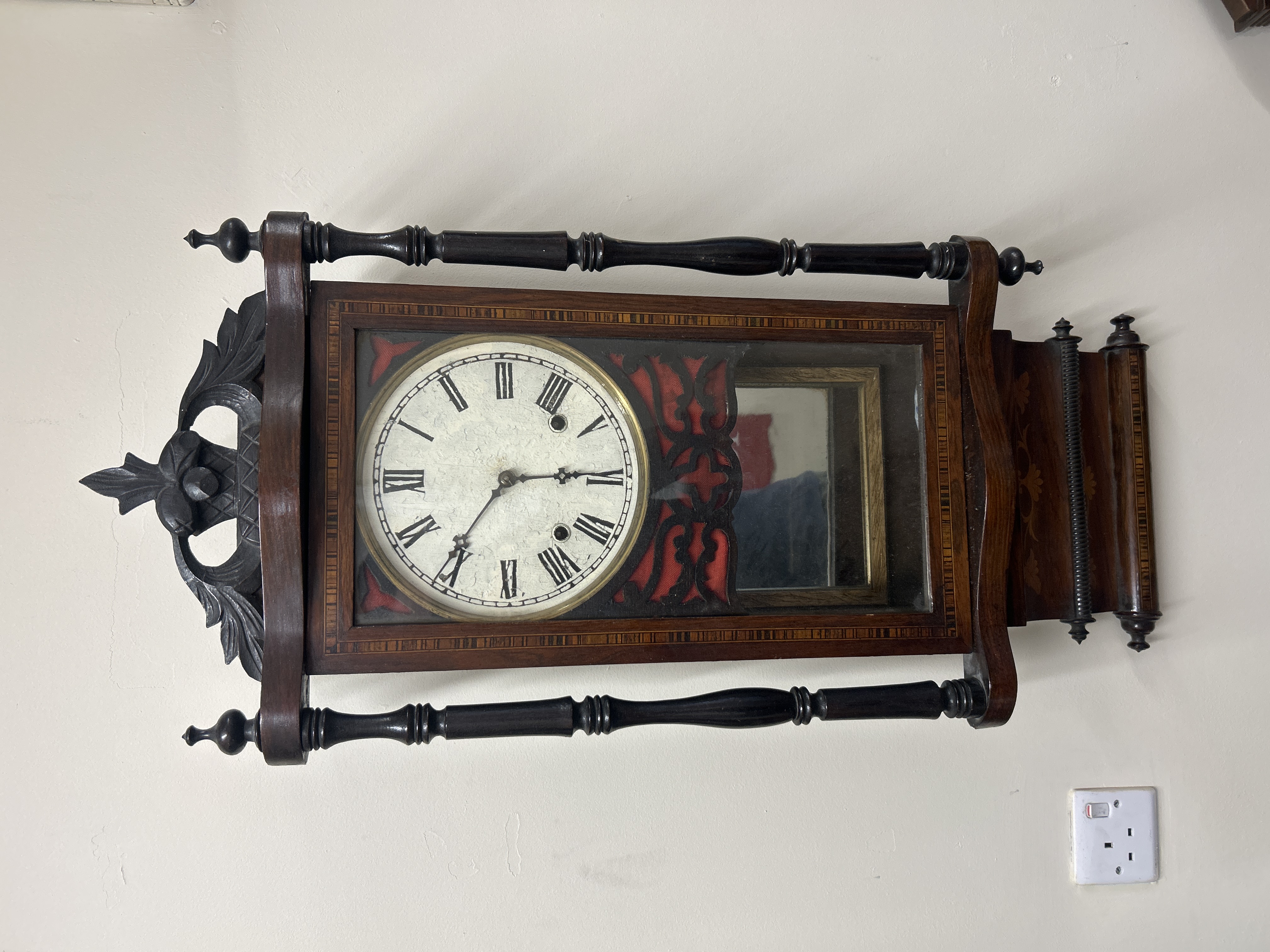 A Victorian Anglo-American mahogany and ebonised weight-driven wall clock
