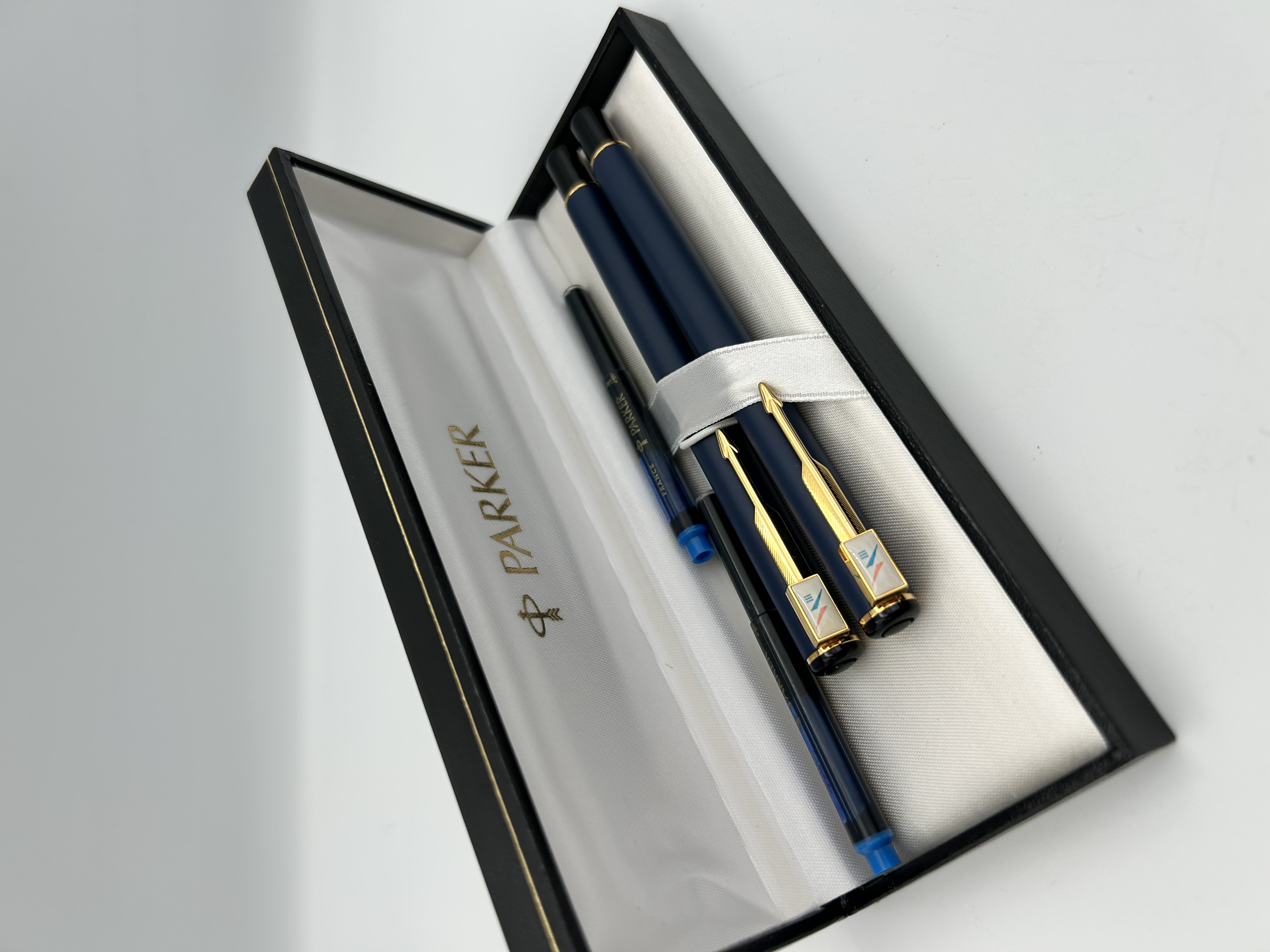 A Parker Vector Matte Navy Blue and Gold Two-Piece Pen Set with British Aerospace Branding
