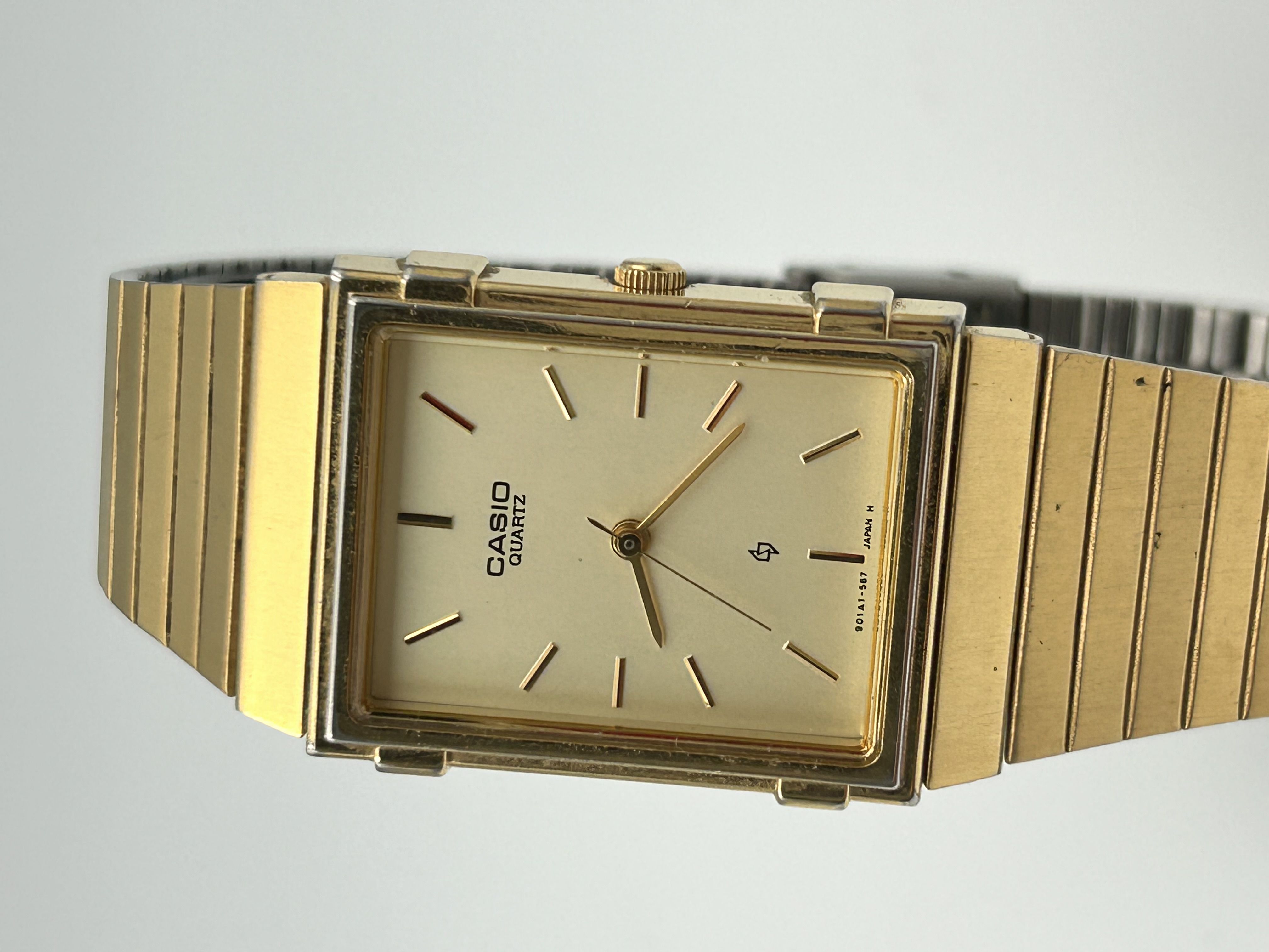 Casio Vintage MQ-310G Quartz Gold Tone Rectangular Wristwatch, Running.