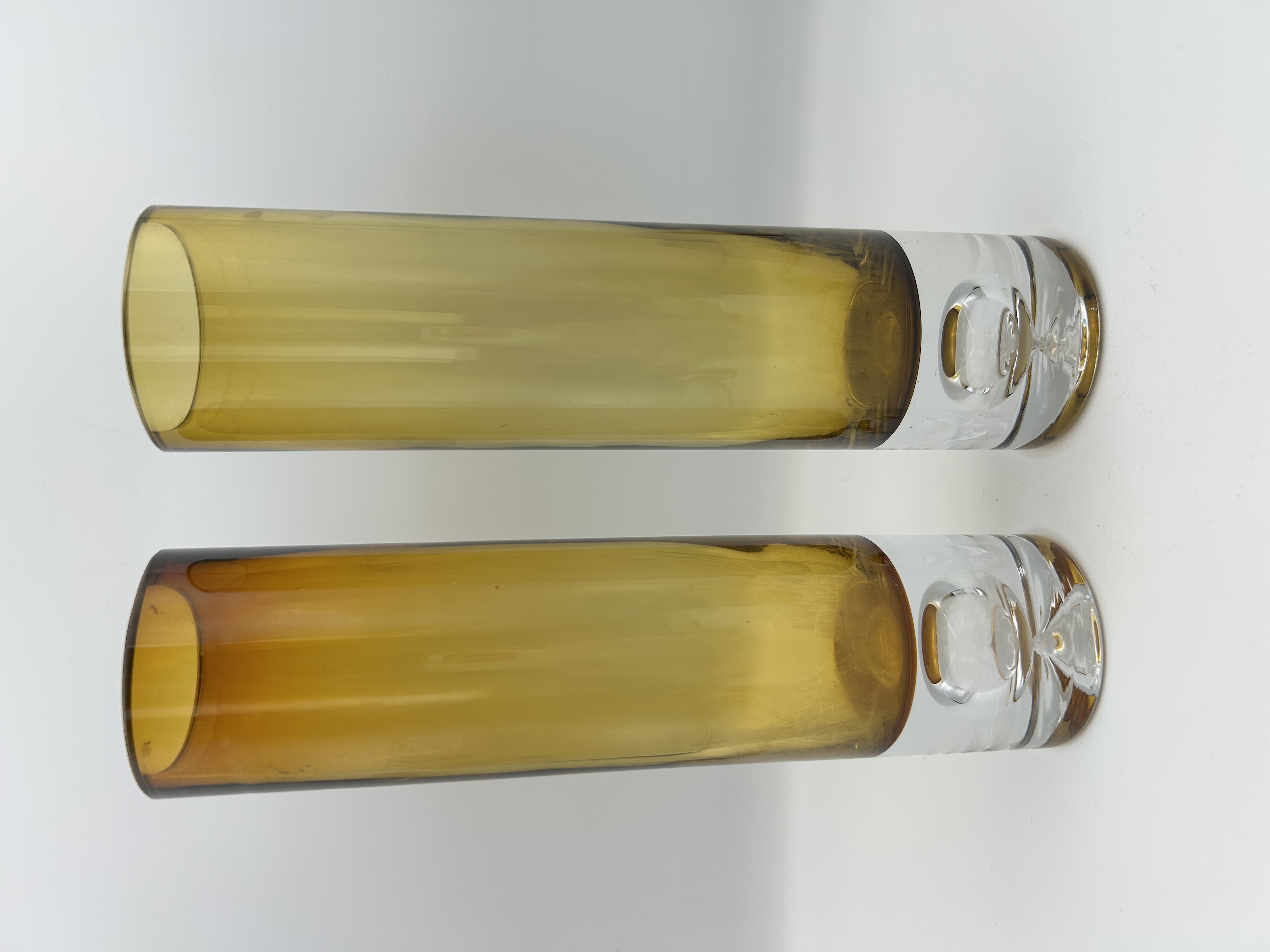 A Pair of Mid-Century Scandinavian Amber Glass Vases with Faceted Bases