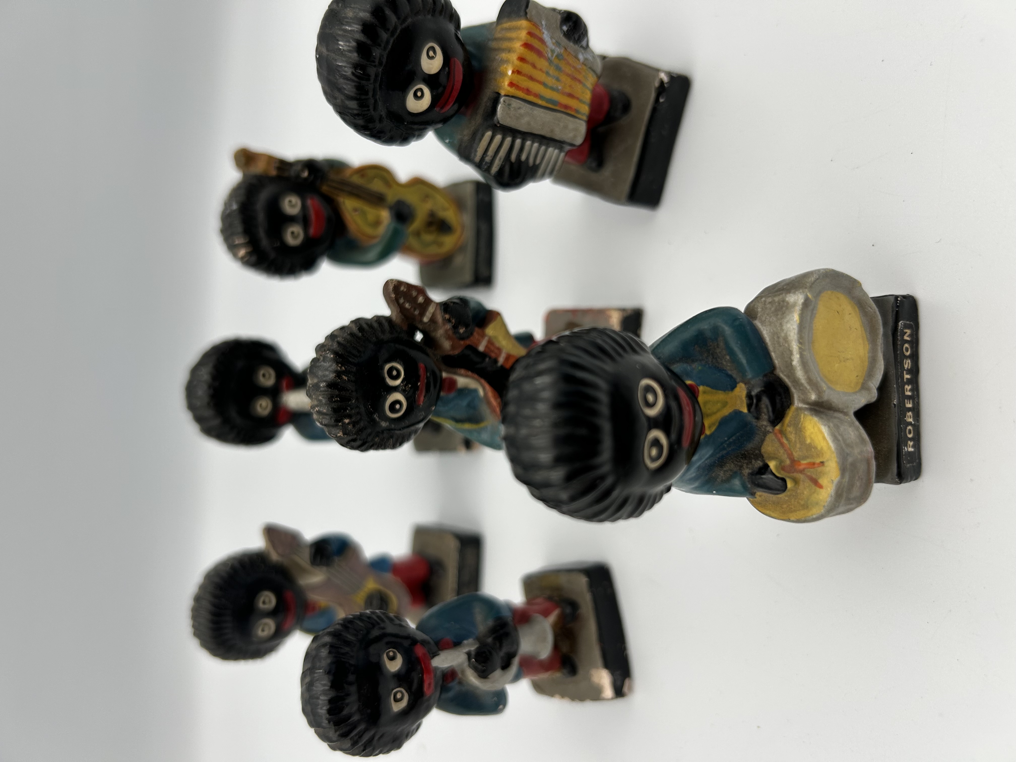 A Collection of Seven Robertson's Jam Golly Musician Figures