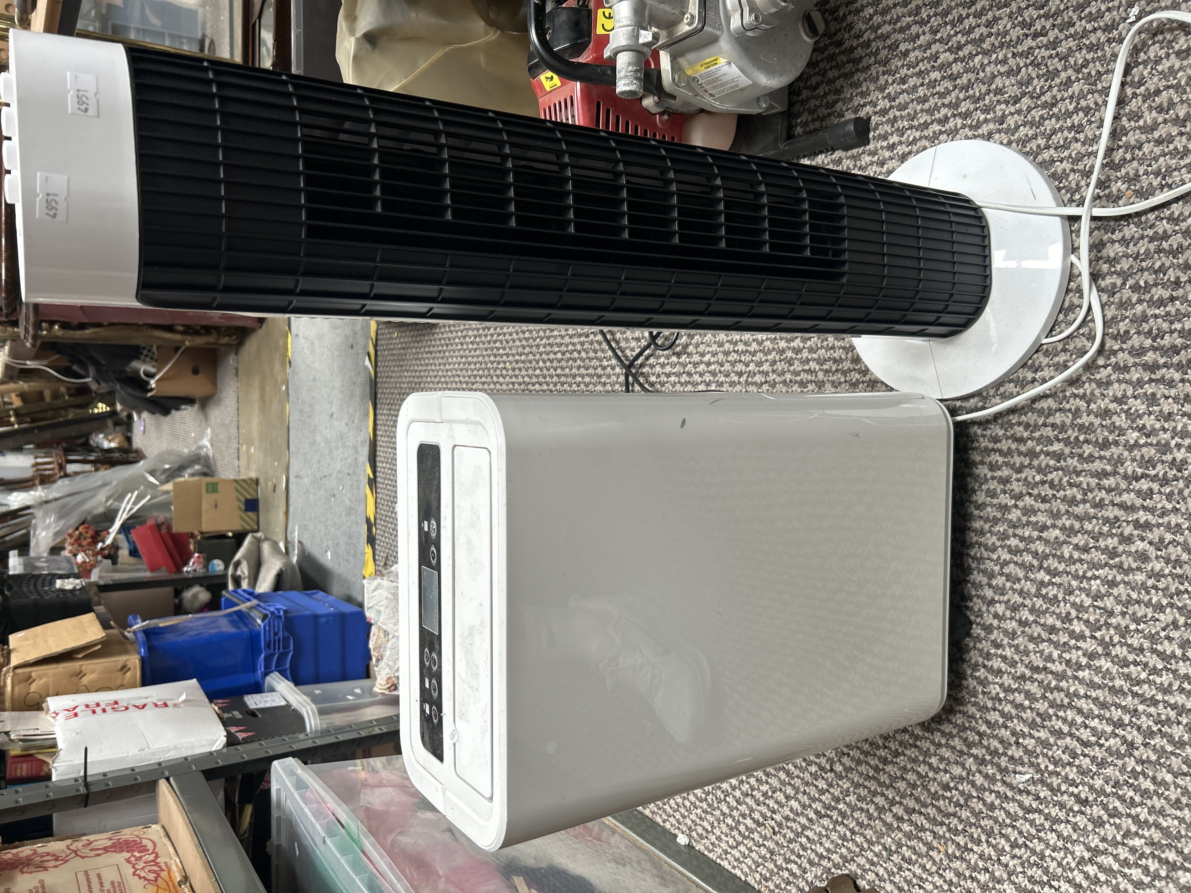 Two Portable Household Cooling Appliances Comprising a Tower Fan and a Portable Air Conditioning Unit