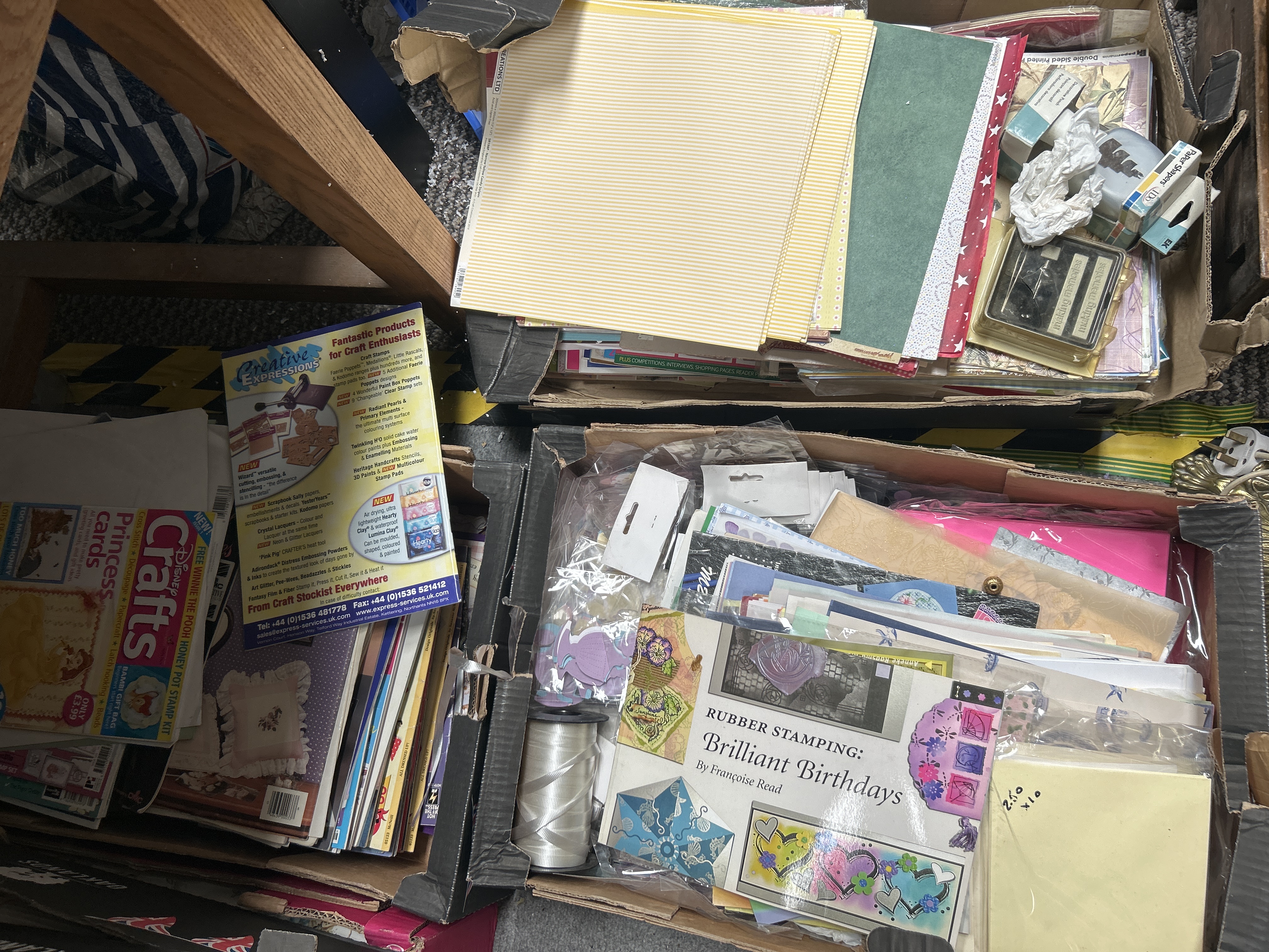 A Large Collection of Papercrafting and Rubber Stamping Supplies Including Making Memories and Disney Brands