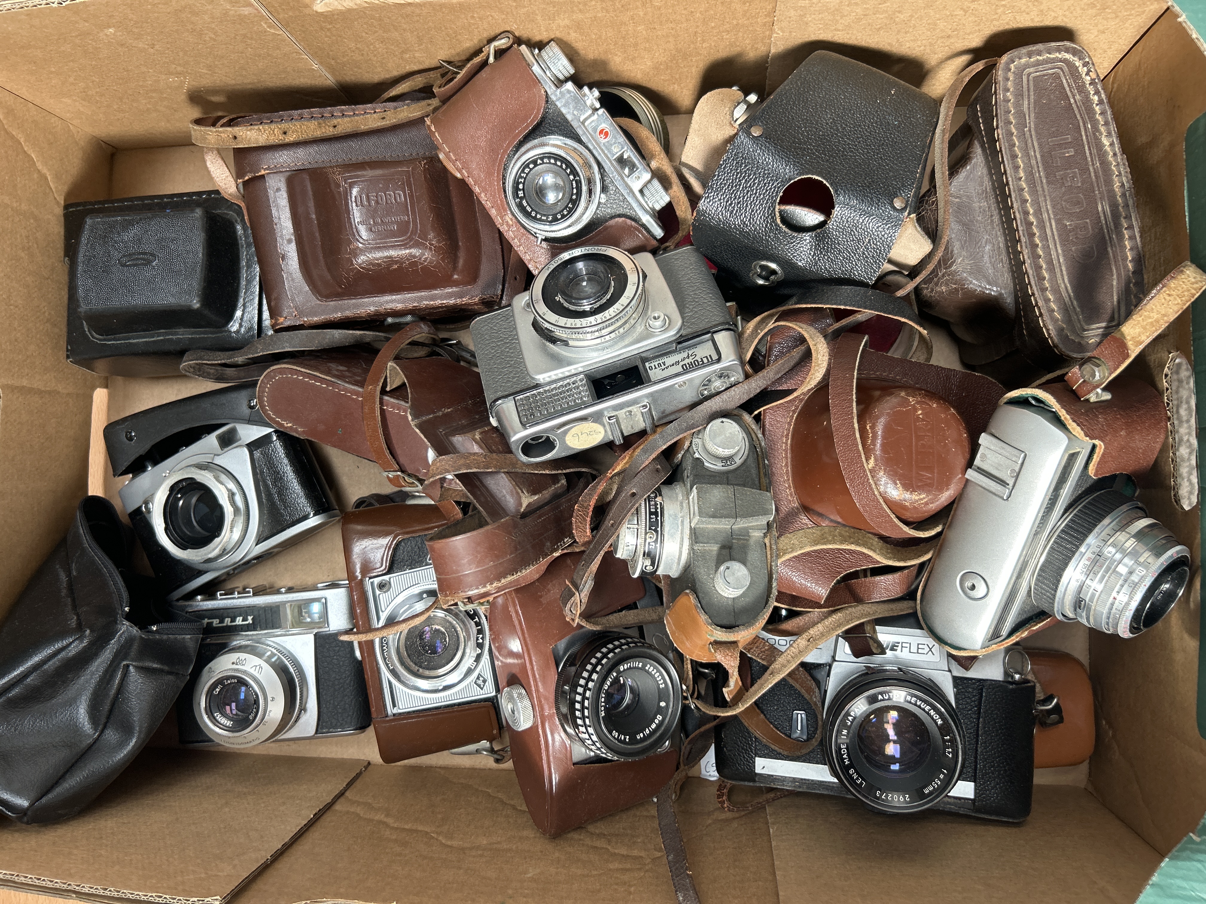 A Collection of Vintage 35mm Film Cameras and Accessories Including Werra 3, Zeiss Ikon Tenax, and Ilford Sportsman Models