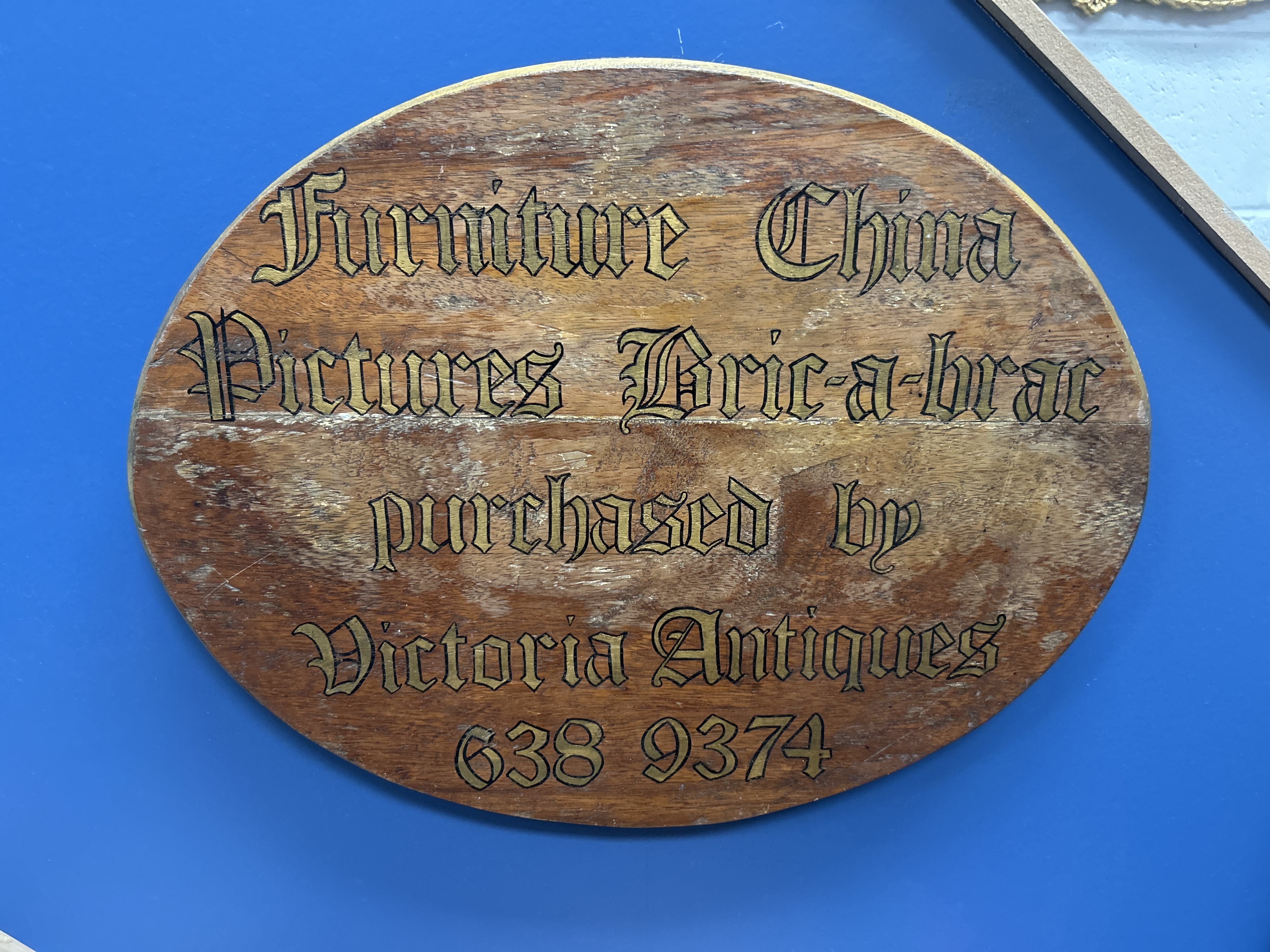 Mid-20th Century Hand-Painted Wooden Trade Sign for Victoria Antiques