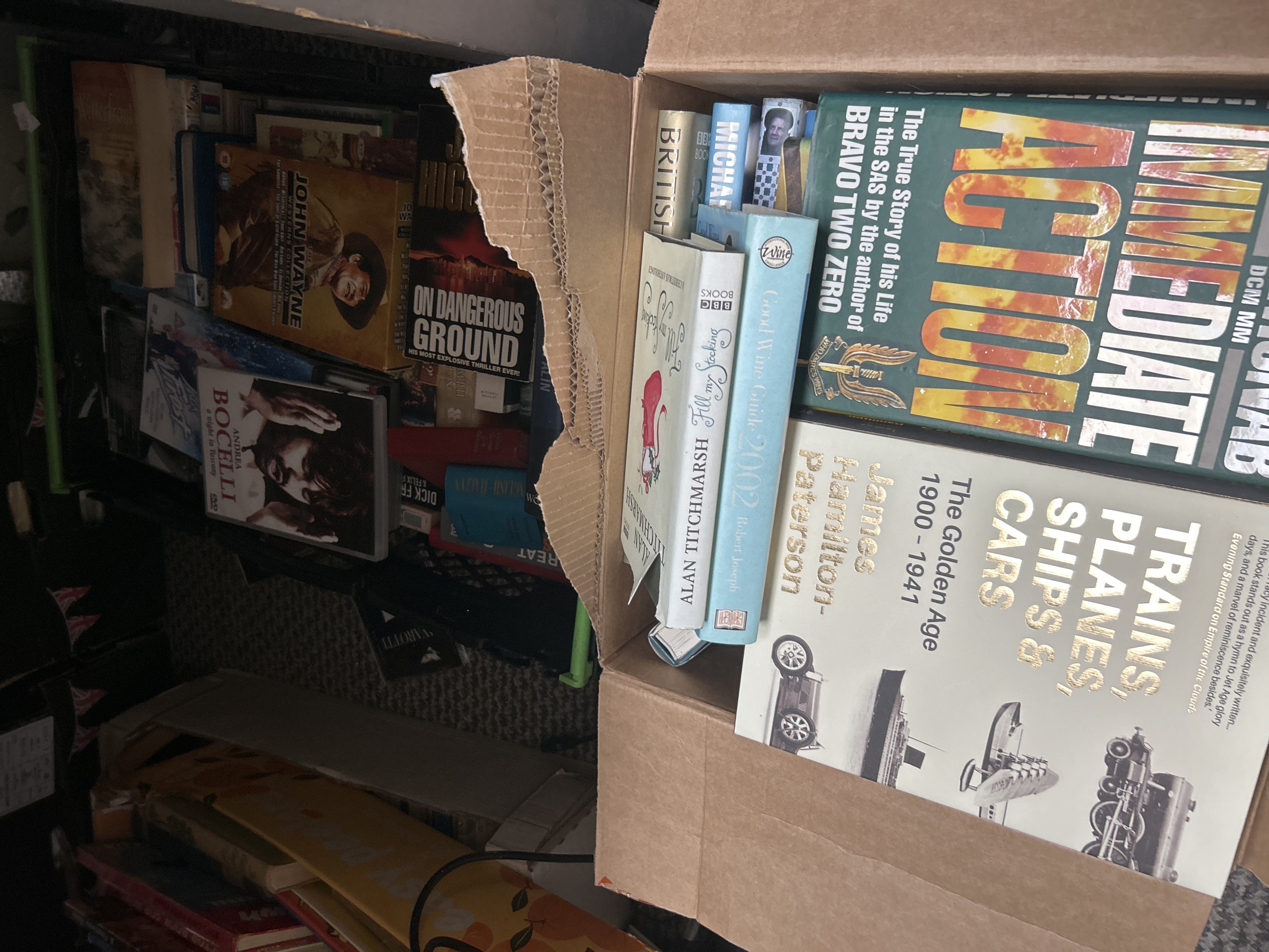 An Assortment of Contemporary Non-Fiction Books, Fiction Titles, and DVD Media