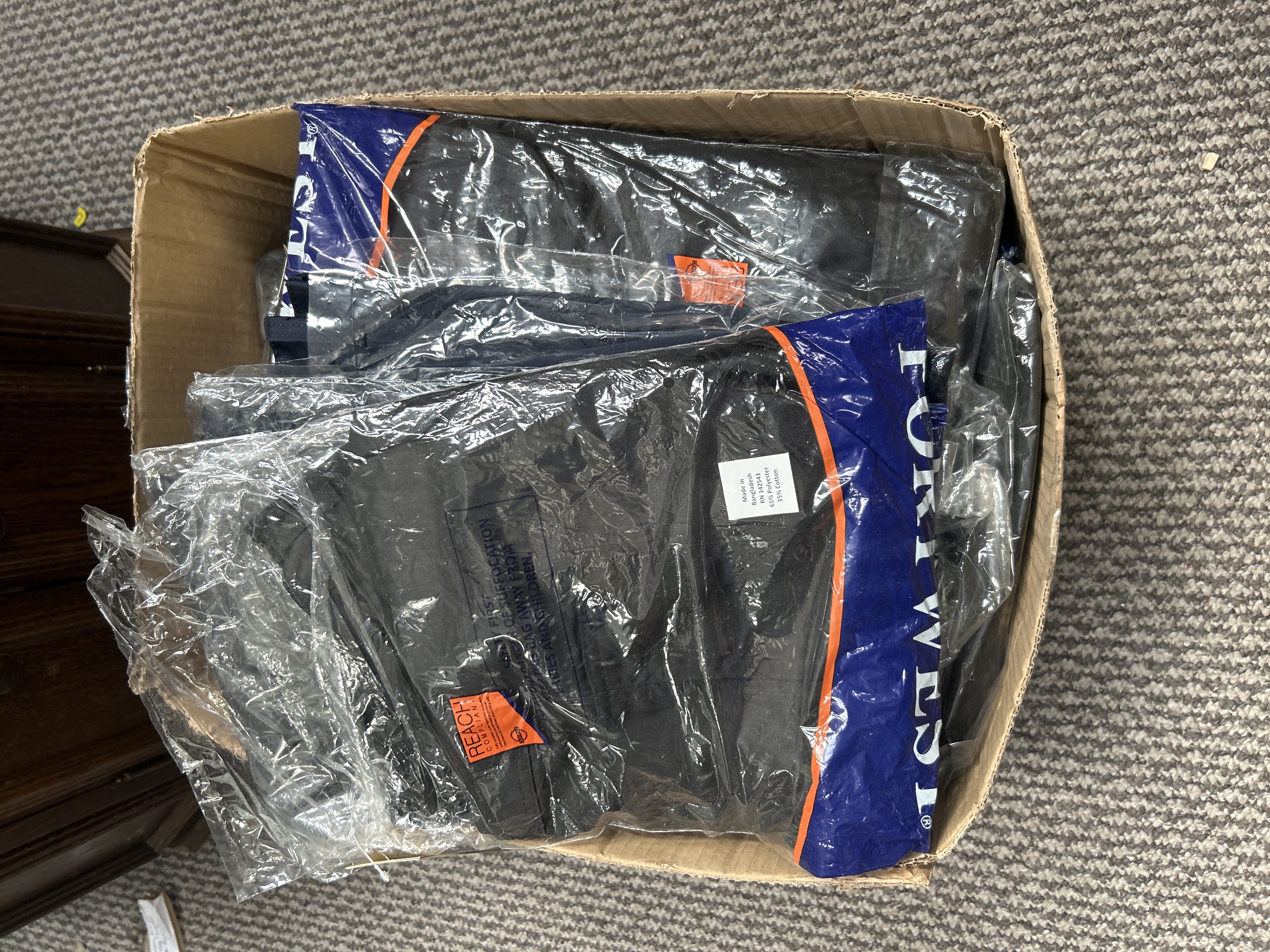 A Group of New Portwest T887 Action Trousers Black Tall Fit