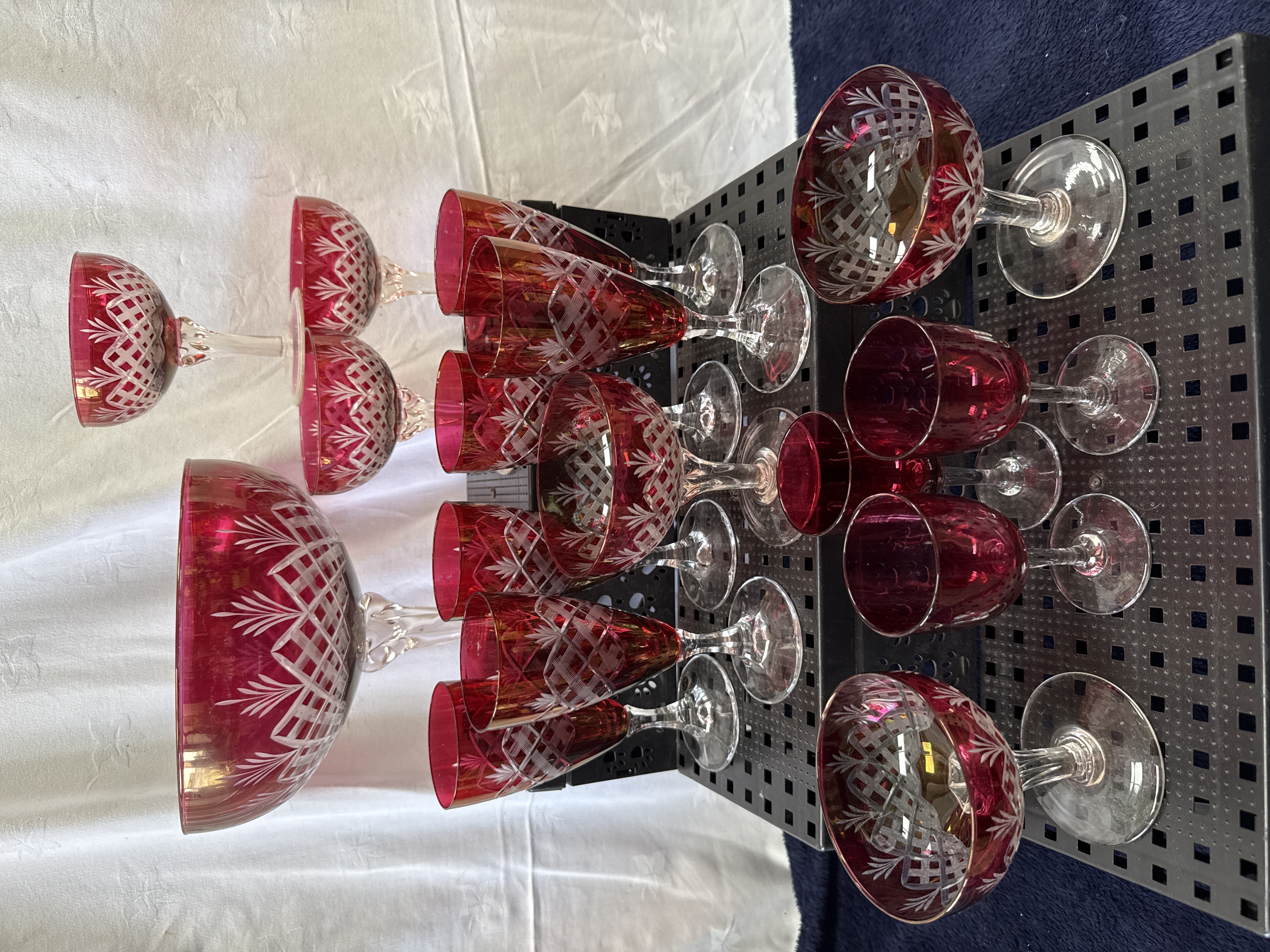 Fourteen-Piece Ruby Red Cut-to-Clear Lead Crystal Glassware Set including a Pedestal Centrepiece Bowl