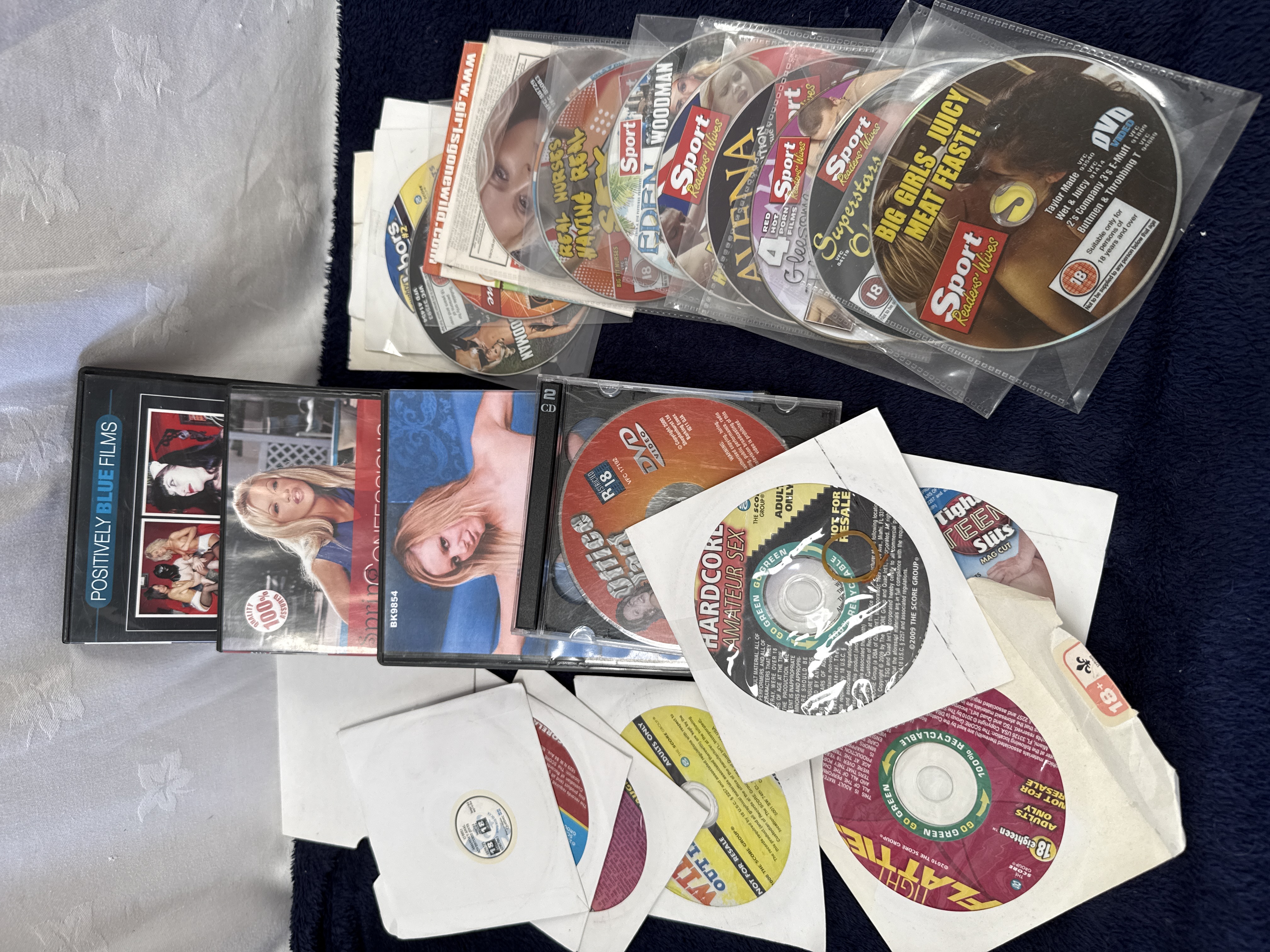 A Collection of 26 Adult Interest DVDs Including Sport Readers Wives and The Score Group Titles