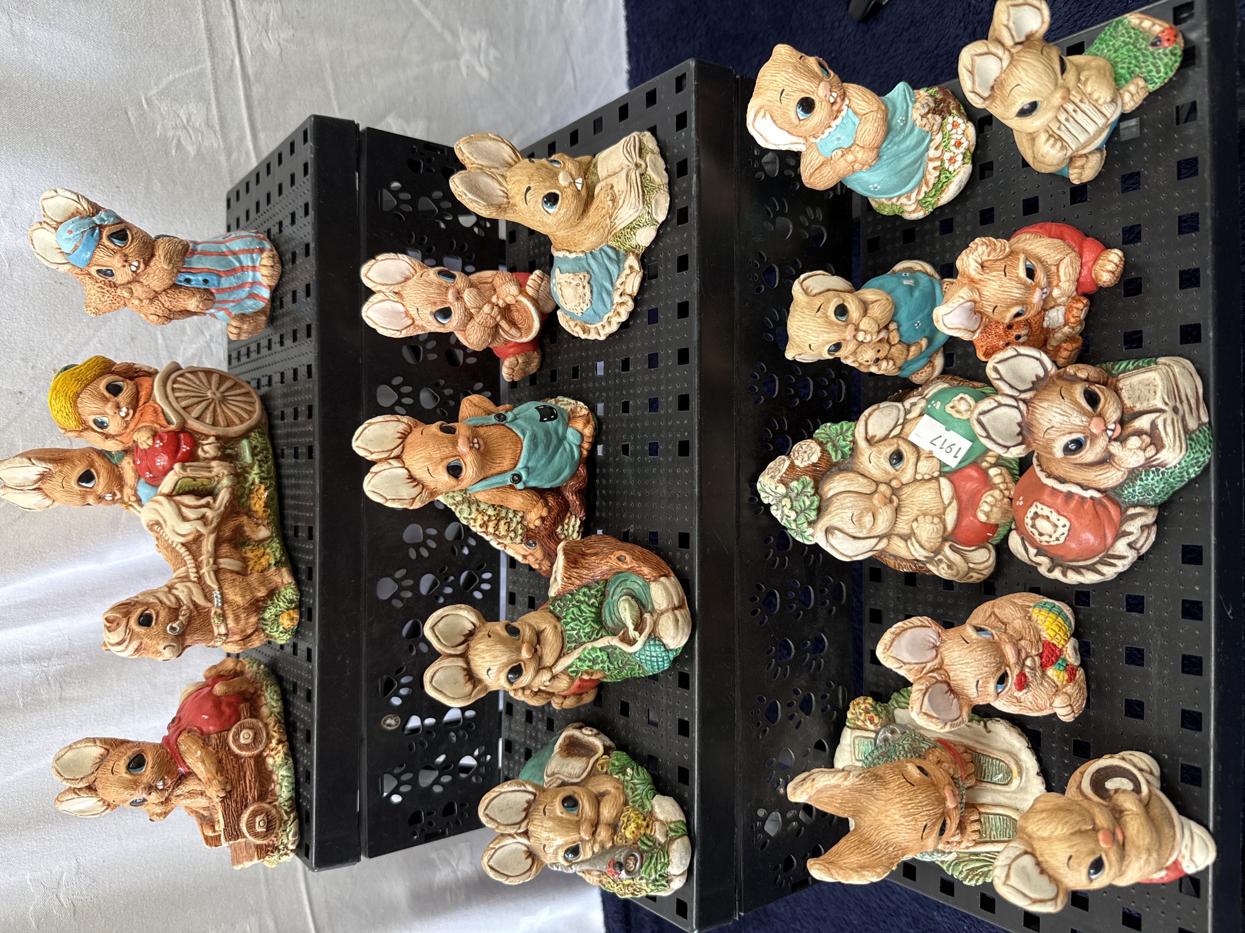 A Collection of 17 Woodlander Stoneware Rabbit Figurines
