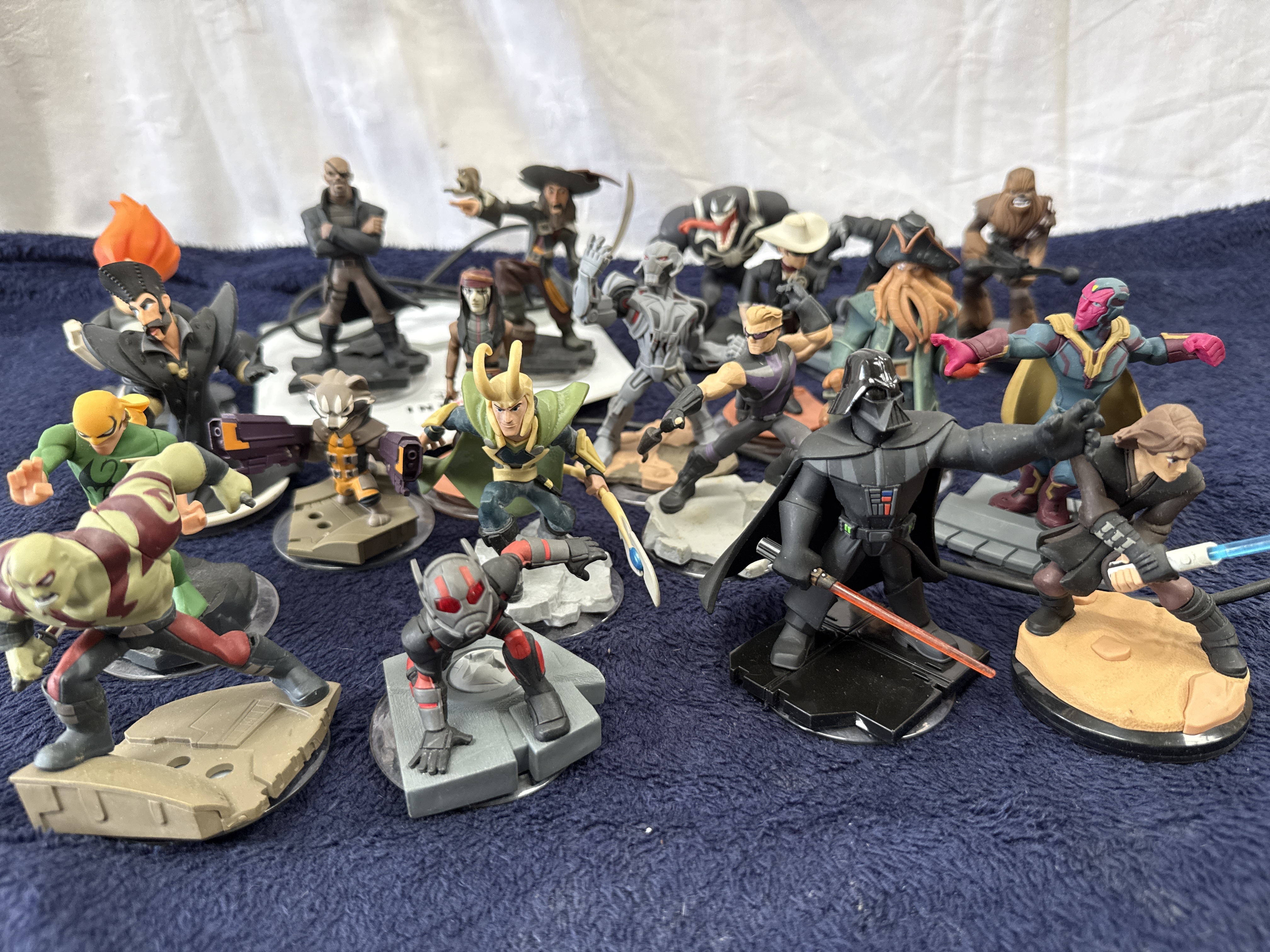 A Collection of 18 Disney Infinity Interactive Video Game Figures and Portal Base