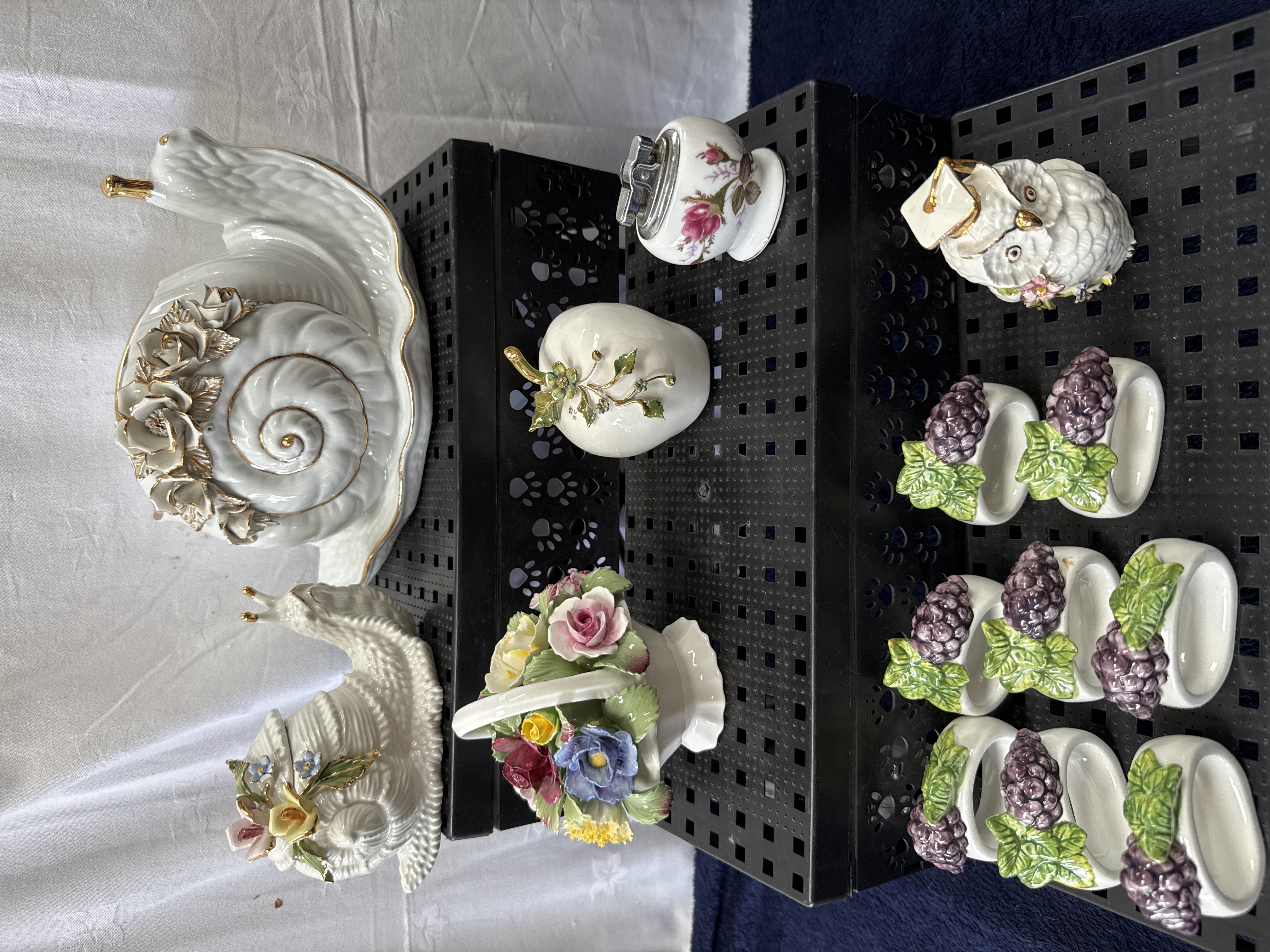 An Assortment of Gilt-Edged and Floral-Applied Porcelain Decorative Wares