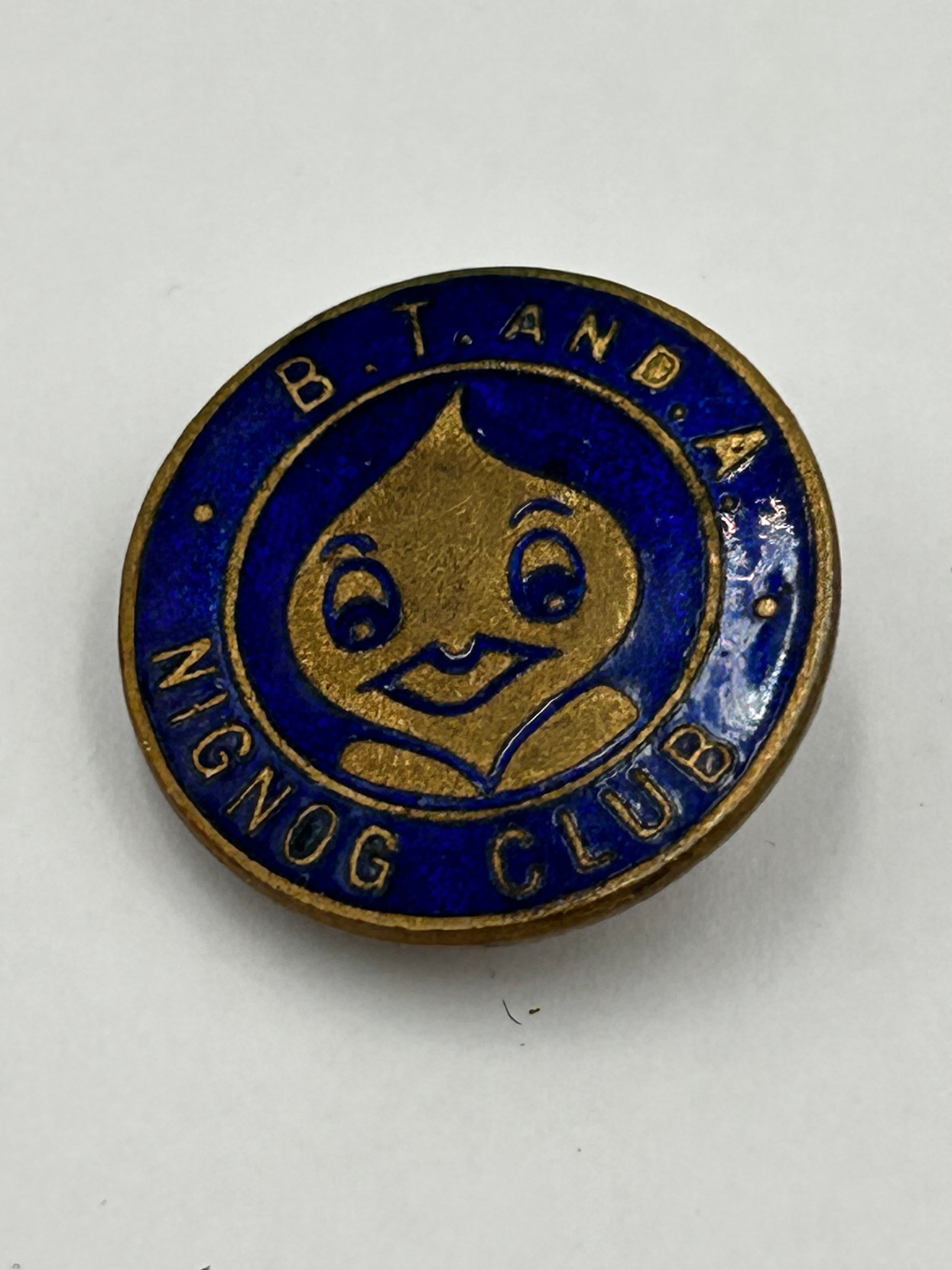 A 1930s? Enamel and Gilt Metal Effect Nignog Club Badge by H. W. Miller Ltd