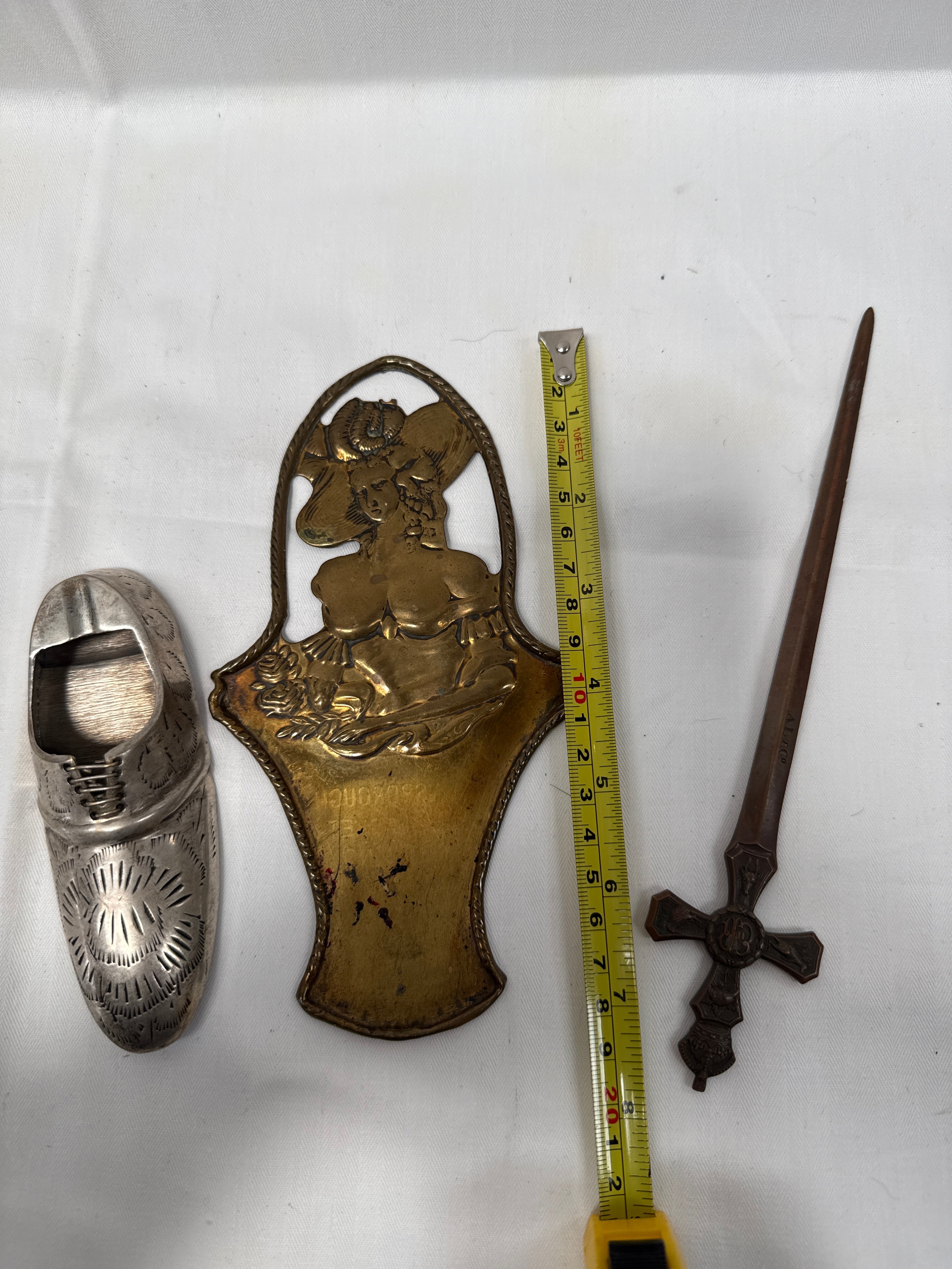 A Collection of Mixed Metal Decorative Items Including an A. L. & Co Letter Opener