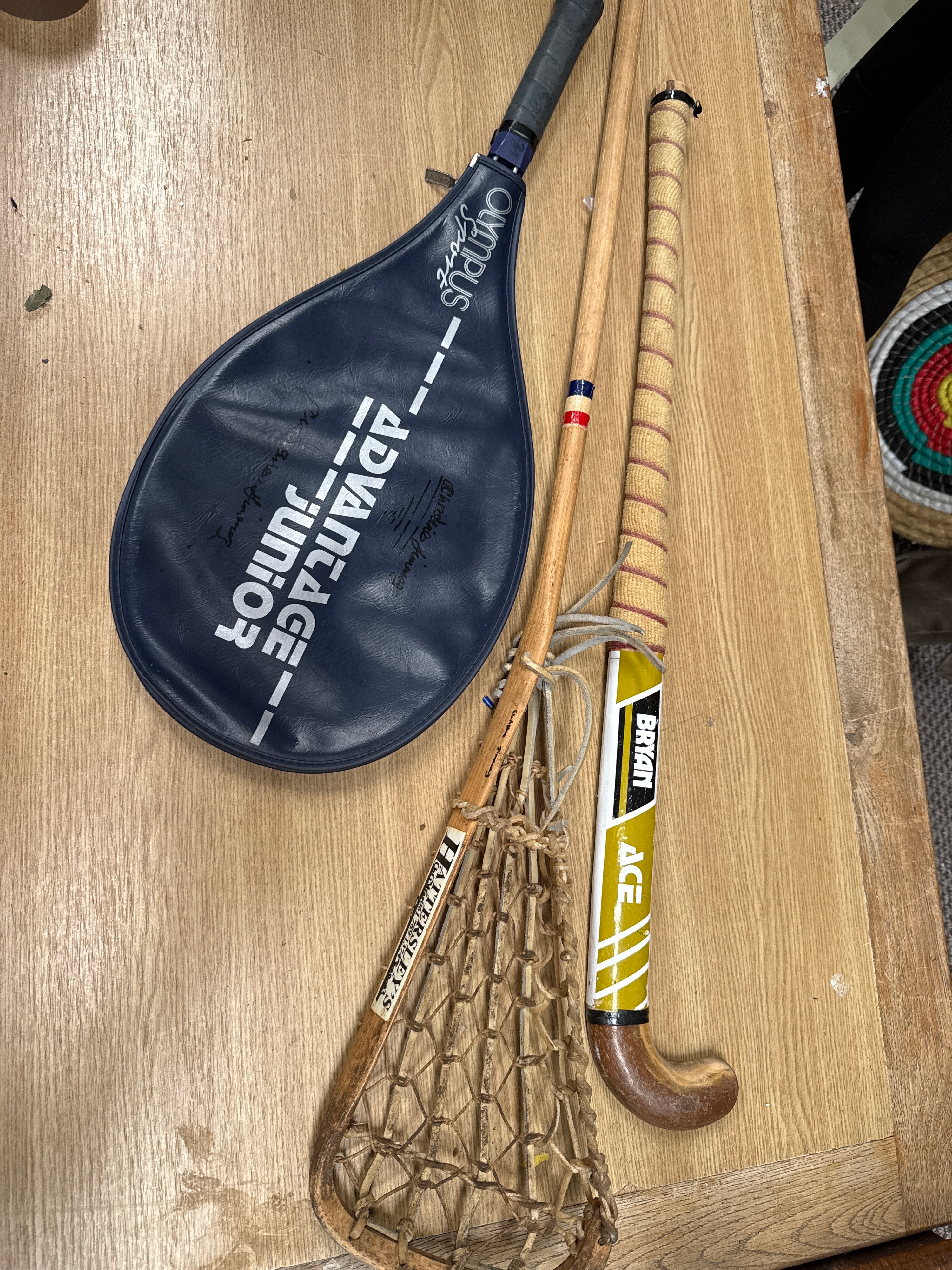 A Trio of Vintage Wooden and Composite Sporting Equipment by Hattersley's, Bryan, and Olympus Sport