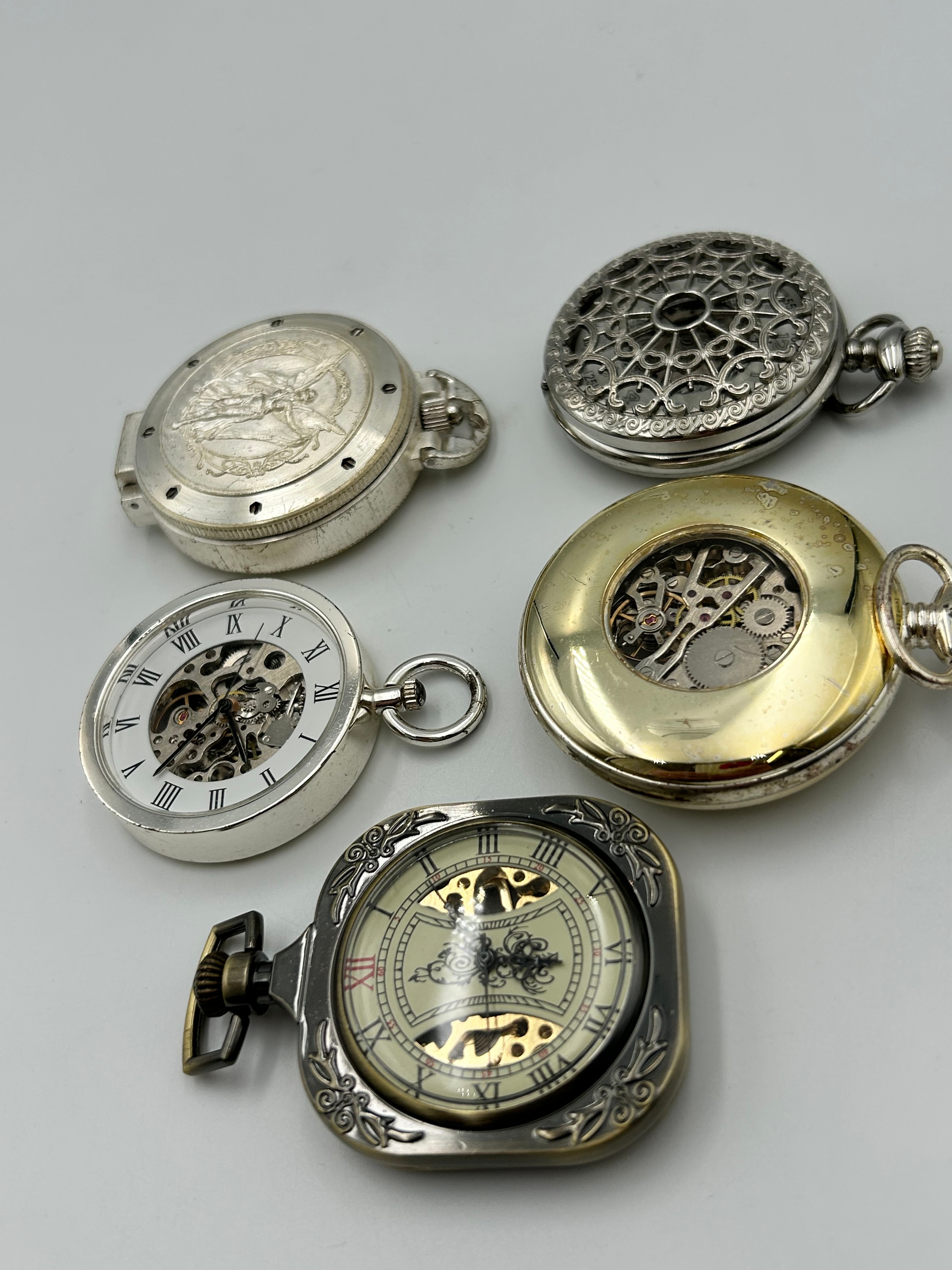 A Collection of White Metal and Gilt Metal Effect Pocket Watches Manual ,Running When Listed