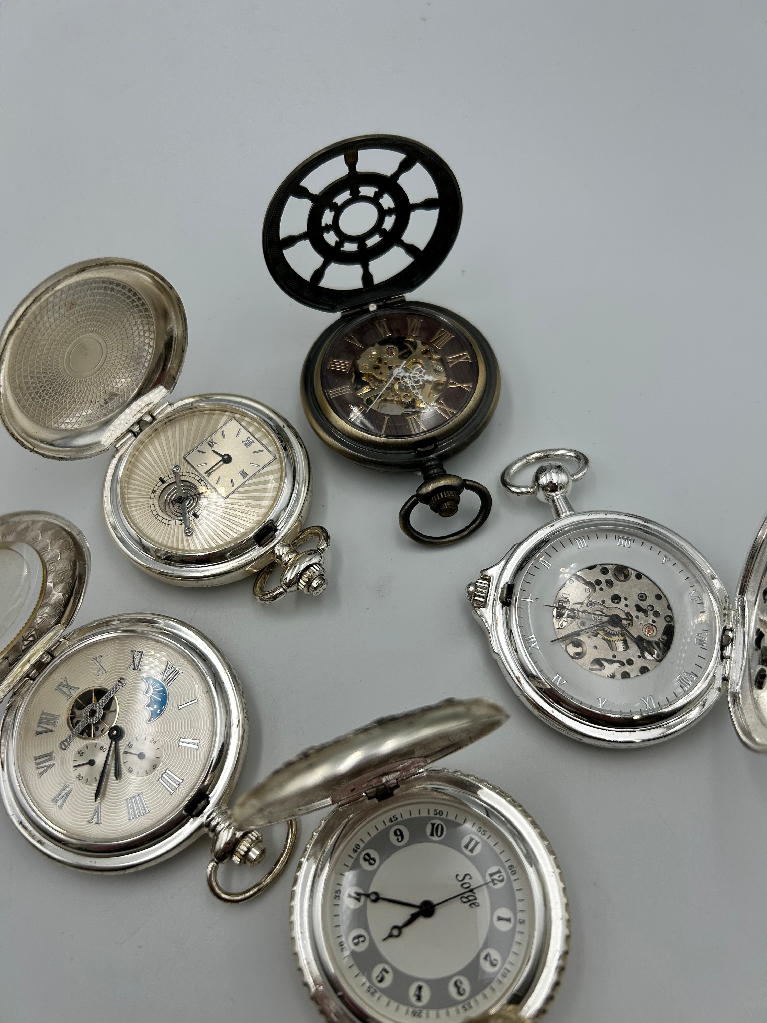 An Assortment of White Metal and Bronzed Mechanical Pocket Watches , Manual ,Running When Listed