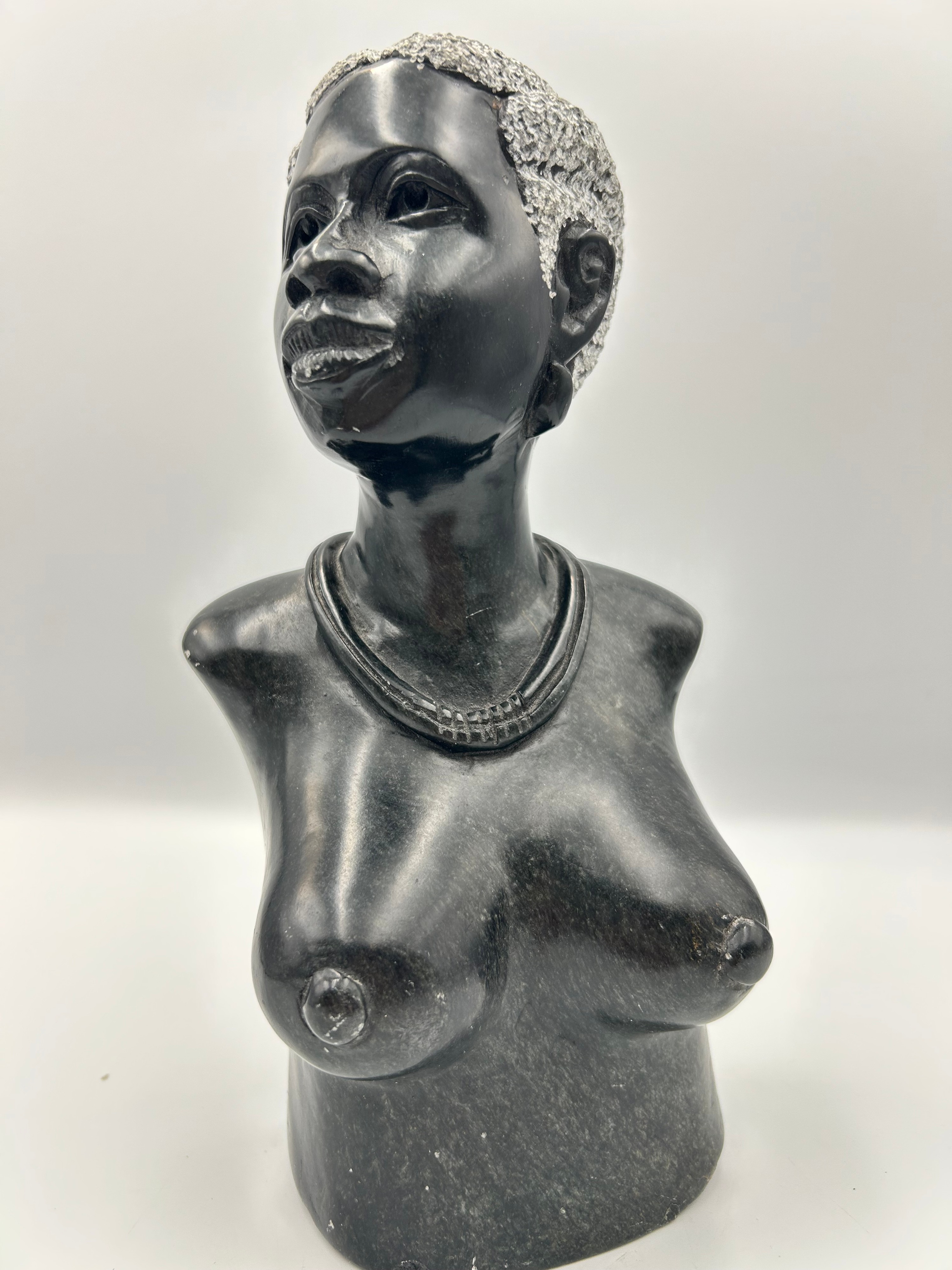 A Fabulous Shona? Polished Black Stone Bust of a Female Figure
