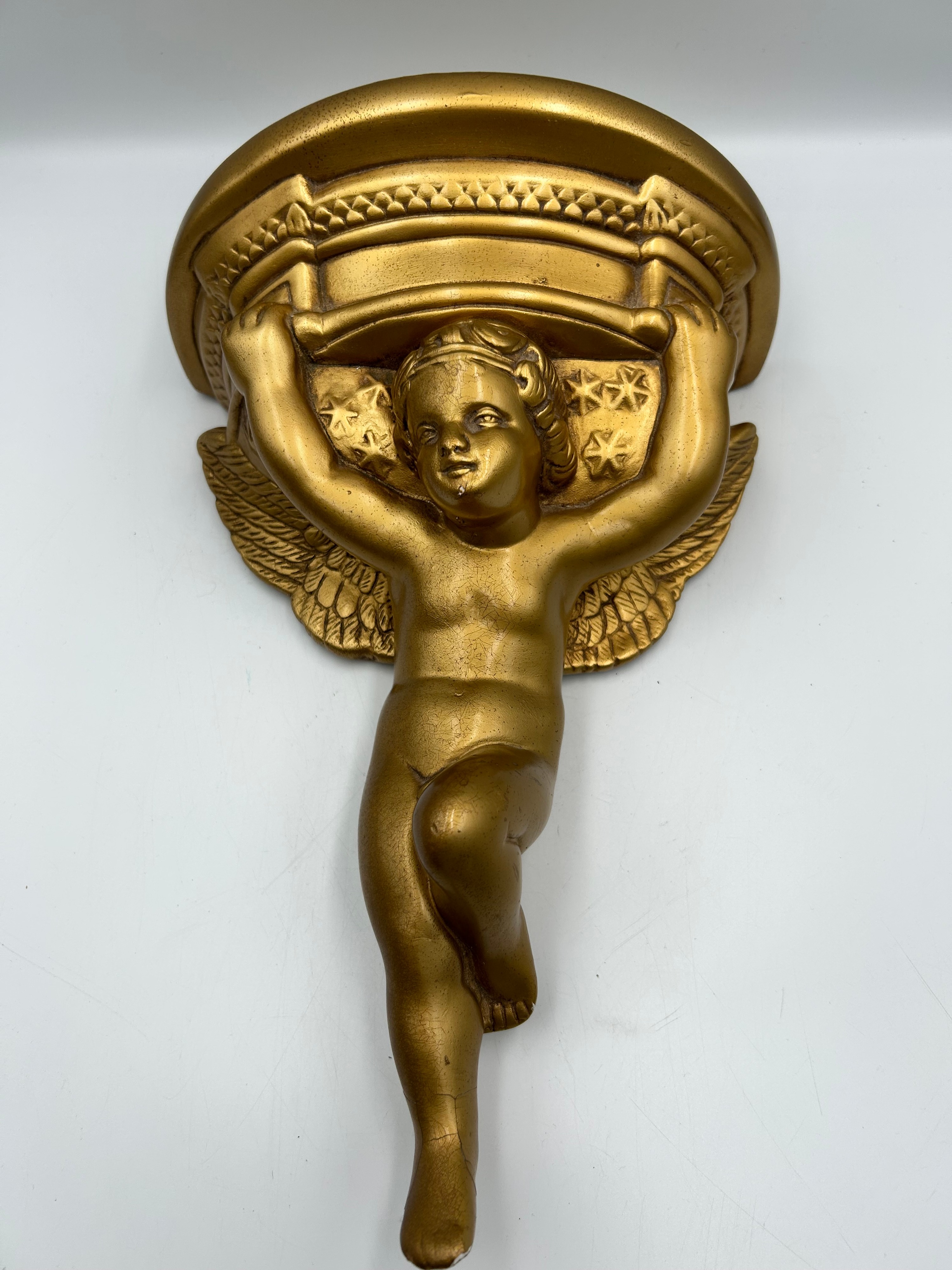 A Gilt Metal Effect and Plaster? Reclining Cherub Wall Bracket, 12"