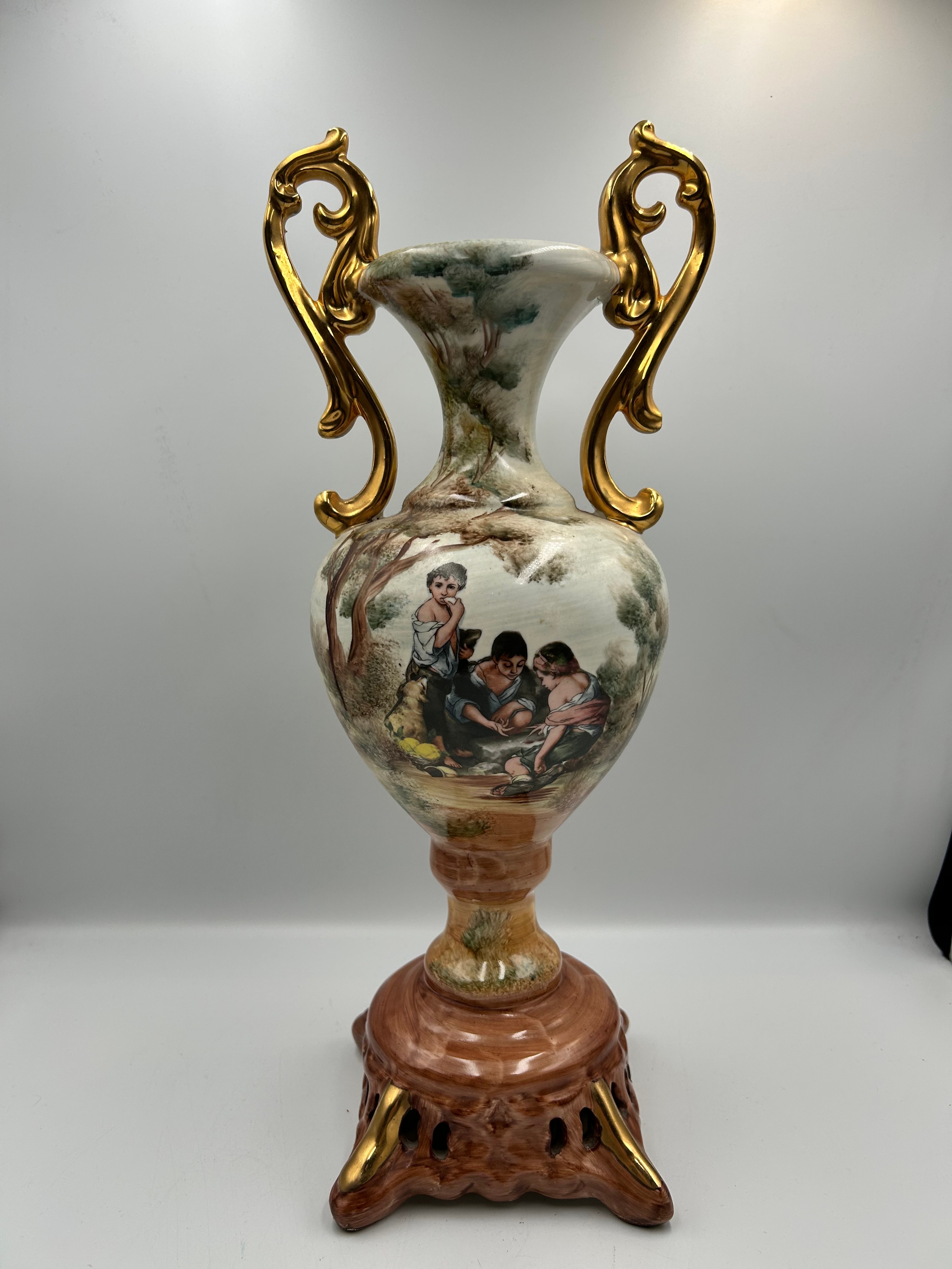 A Large Twin-Handled Ceramic Vase Decorated with a Pastoral Scene