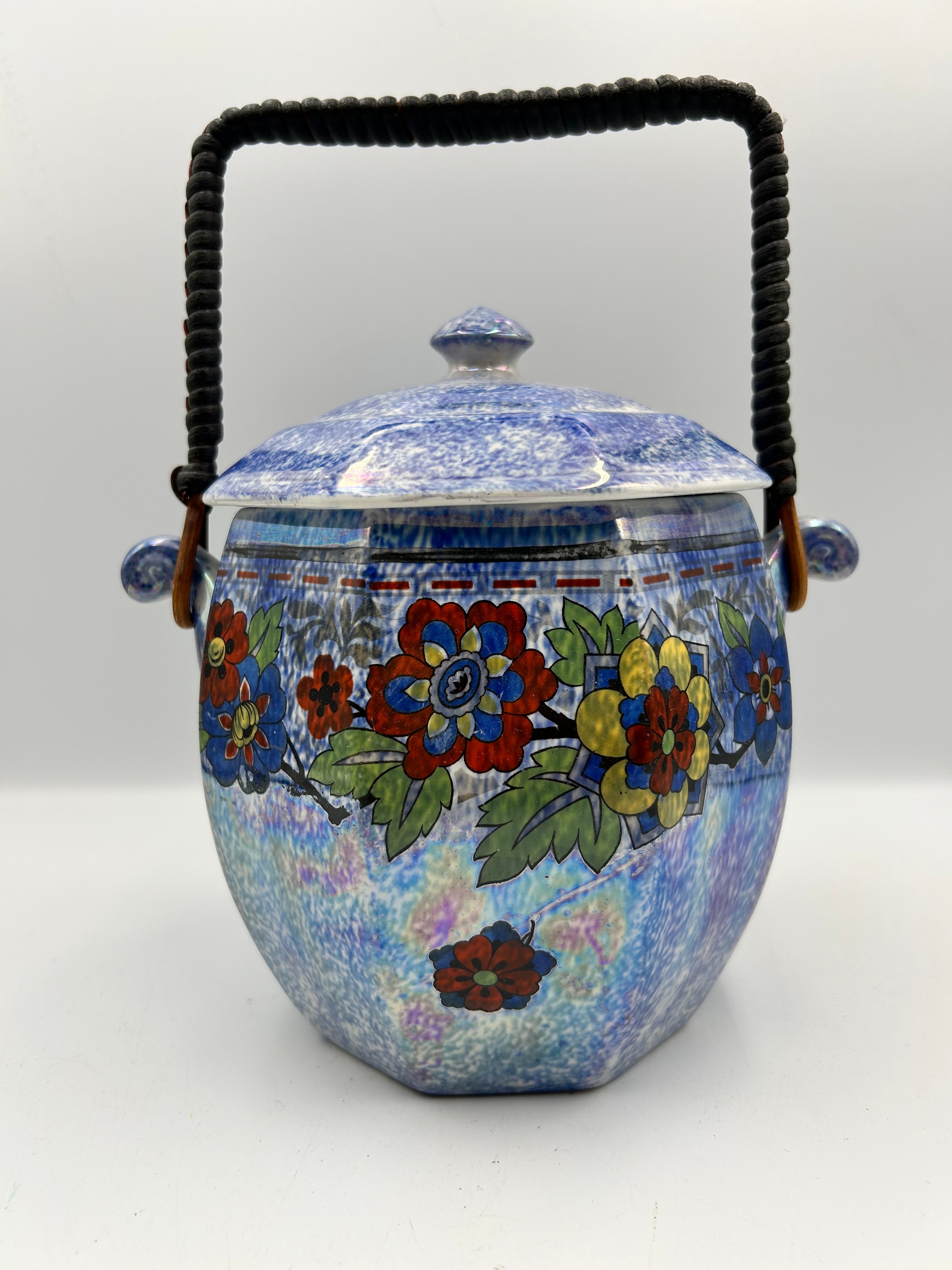 A Rubian Art Pottery Lustre Glazed Biscuit Barrel with Floral Decoration