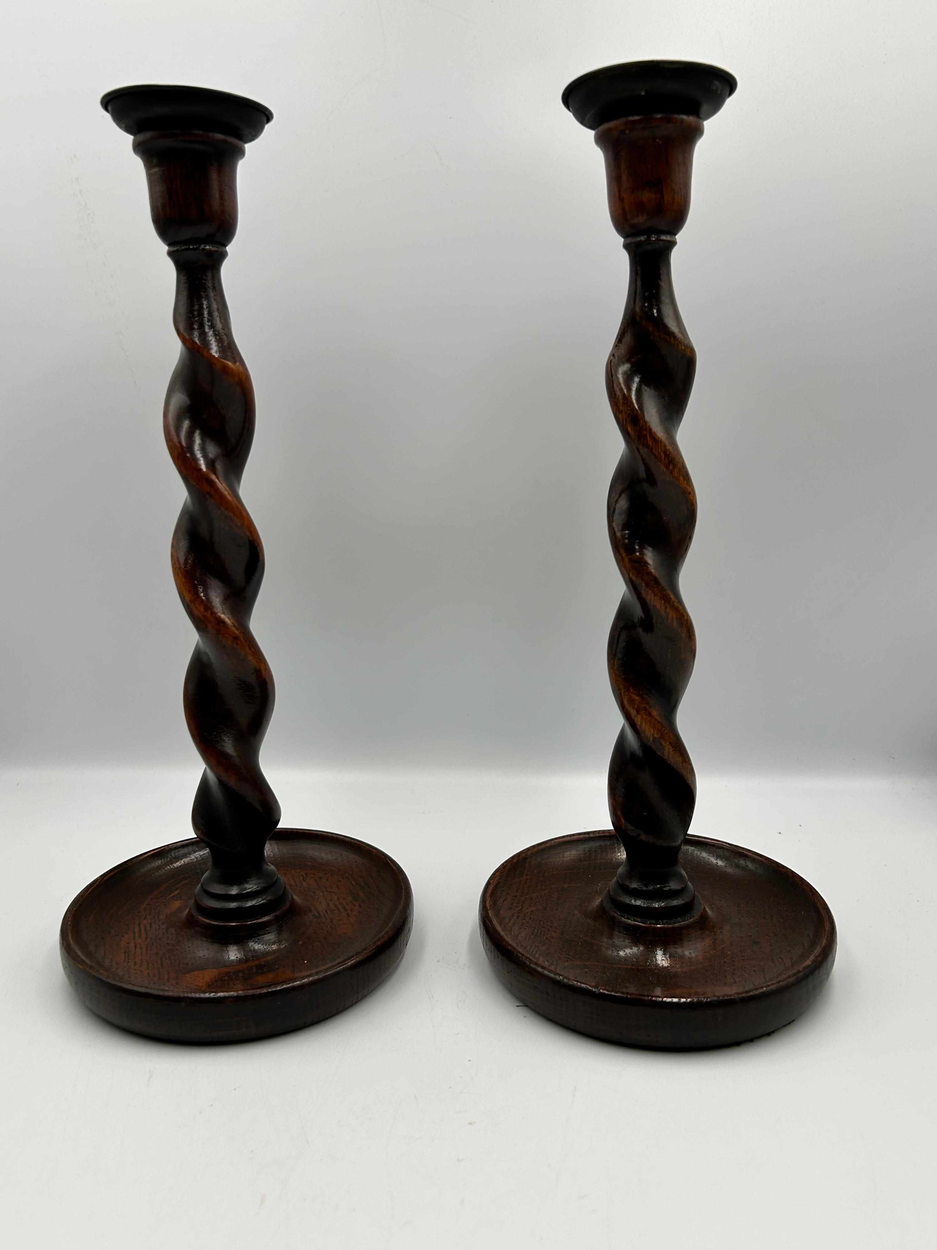 A Pair of Antique English Oak Barley Twist Candlesticks