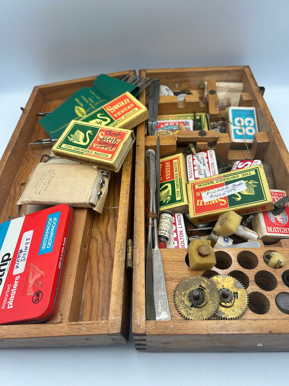 Lot 478: Mid-20th Century? Wooden Horological Tool and Repair Kit with Brass Clock/Watch Components, 15"