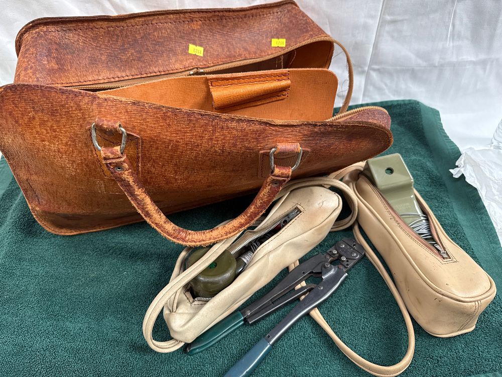 Lot 503: Mid-20th Century Leather? Tool Bag with Stanofone? Field Telephone Handsets