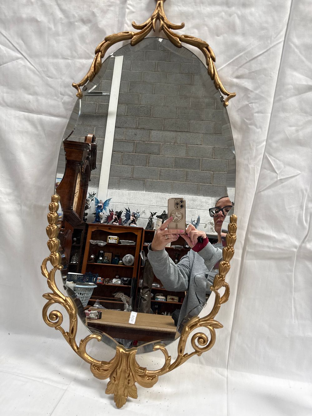 Lot 518: A Late 20th-Century French Rococo? Style Gilt-Metal Effect Oval Wall Mirror