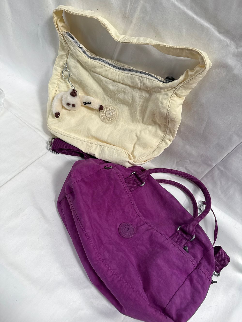 Lot 531: Kipling Crinkled Nylon Handbags, Two, Including a Hobo and a Satchel Tote
